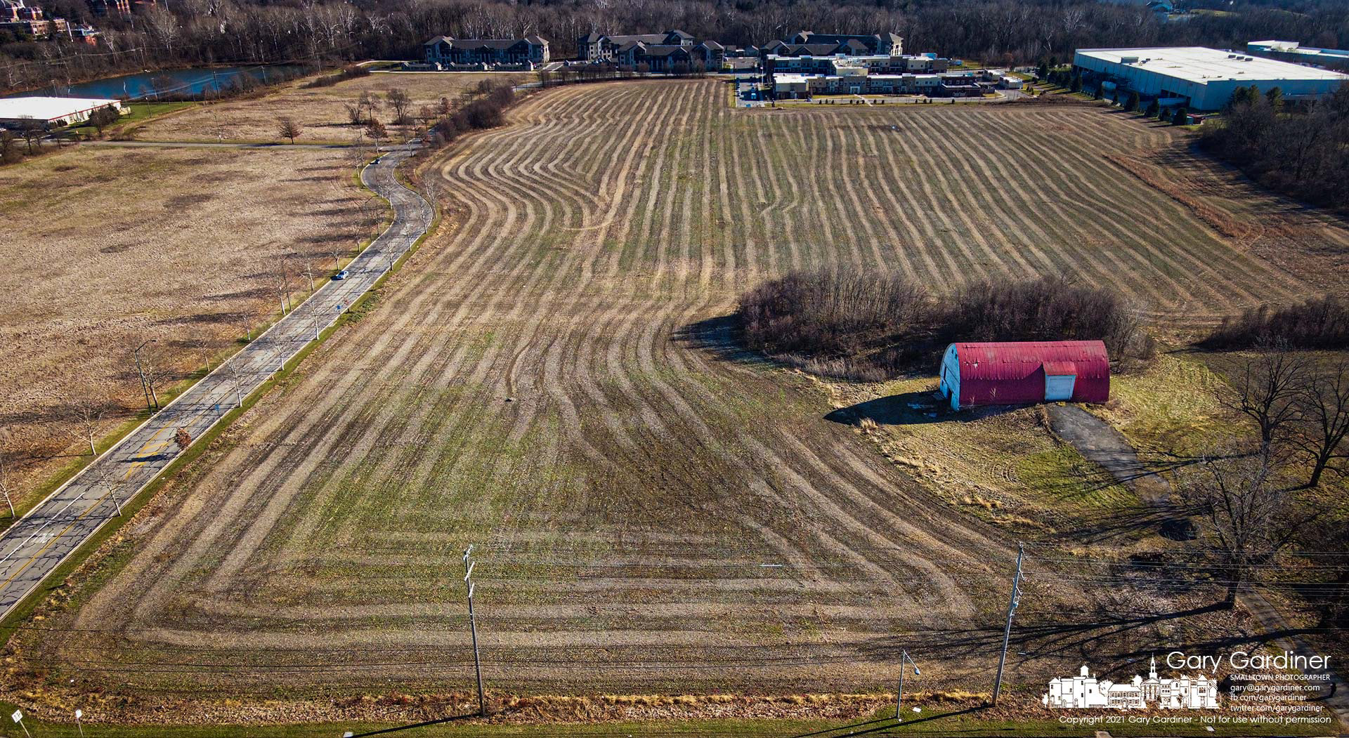 Rows marking the path of a soybean combine create a pattern across the fields at the Braun Farm marking the end of the season. My Final Photo for Dec. 20, 2021.