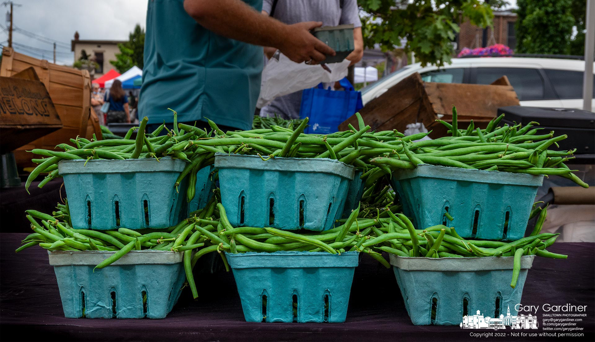 Containers of Ohio-grown green beans sit on display at a farmer's booth early in the day at the Saturday Farmers Market in Uptown Westerville. My Final Photo for August 6, 2022.