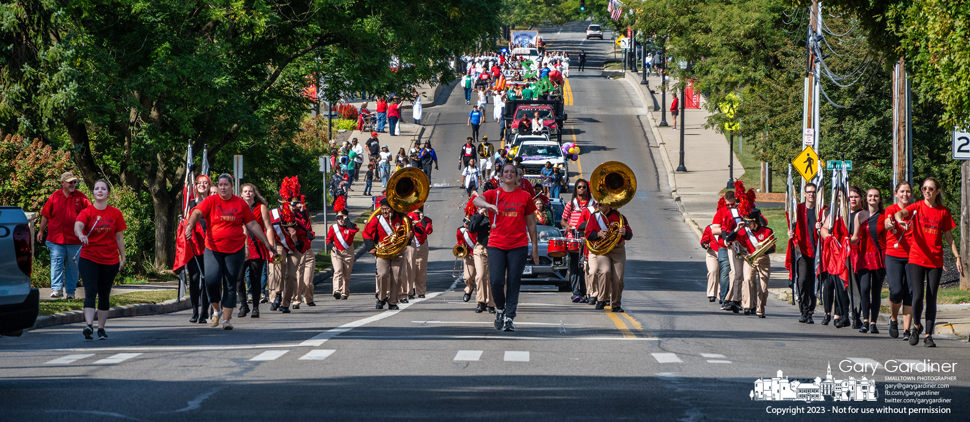 The Otterbein Marching Band leads the school's homecoming parade across the Main Street bridge toward Grove Street for the final procession through campus before ending near the football field for the afternoon game. My Final Photo for September 16, 2023. https://bit.ly/3EHVmk4