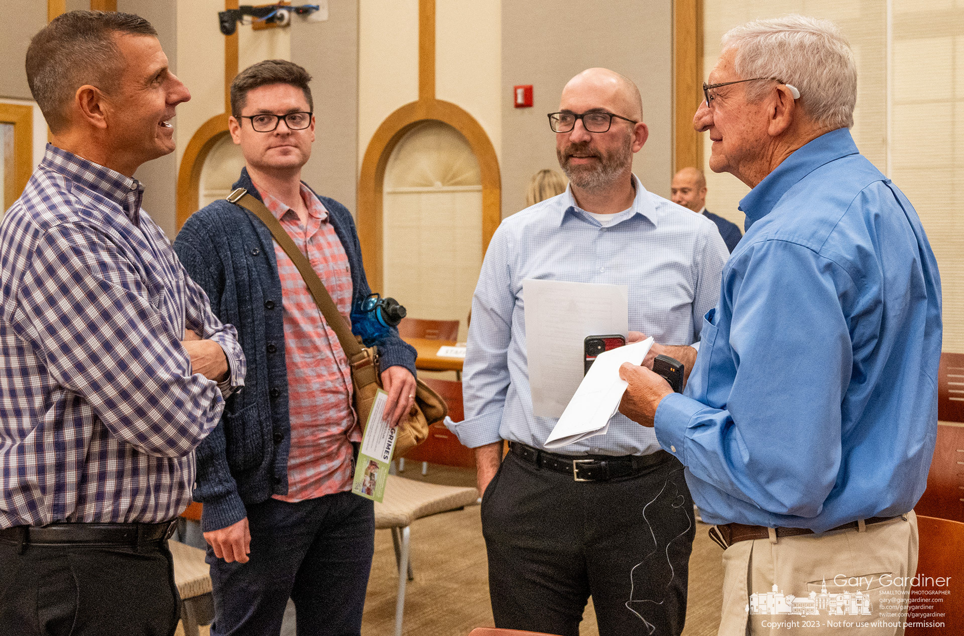 Tom Curry, right, talks with three Westerville City Council candidates after a council meeting where he spoke during citizens' comments about the lack of news media coverage of candidates for local elections. From left to right are candidatesJeff Washburn, David Grimes, and Aaron Glasgow. My Final Photo for October 17, 2023. https://bit.ly/3S3i1PK