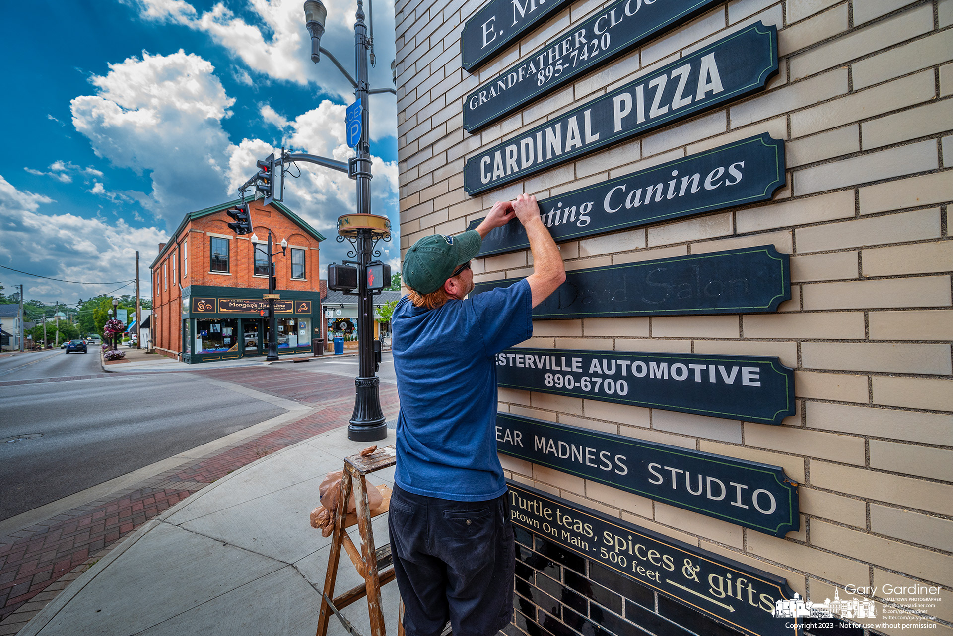 Lettering for Captivating Canines and Michael David Salon are removed from markers on East Main after both the stores recently closed and are awaiting new tenants. My Final Photo for August 4, 2023. 