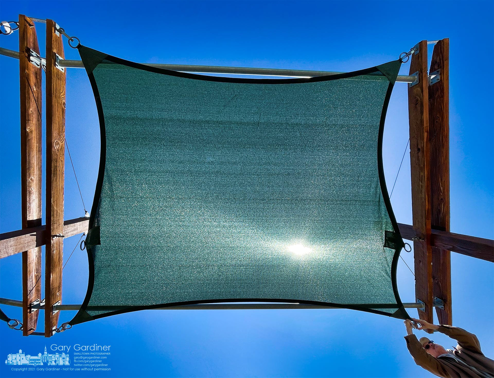 Awnings that cover lounge chairs at the highlands Pool are installed Monday as the parks department plans for what is the expected opening of the city's pool after last year when they did not open because of the pandemic. My Final Photo for April 26, 2021.