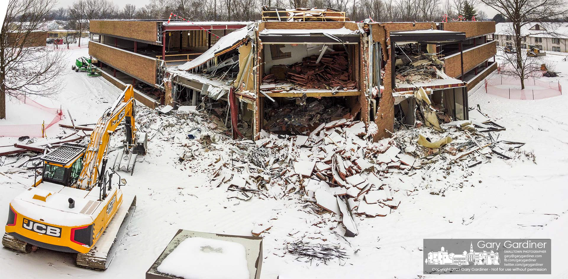 A portion of the facade and most of the interior is being removed to convert an office building on Huber Village Blvd. into the new Westerville police station and court. My Final Photo for Feb. 9, 2021.