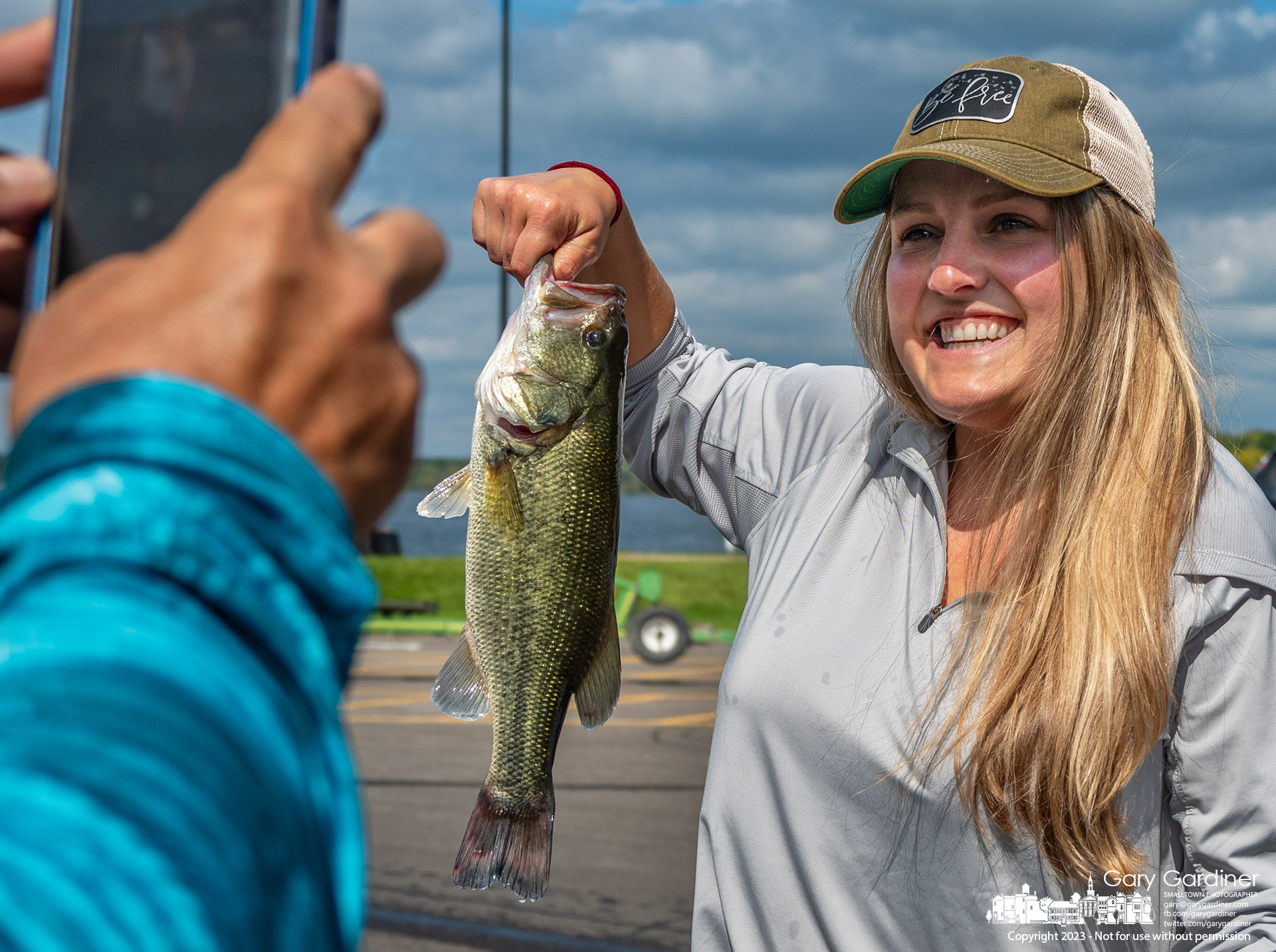 A proud stepfather takes a photo of his stepdaughter after what he said was her first successful smallmouth bass fishing competition on Hoover Reservoir Sunday afternoon. My Final Photo for September 10, 2023. 