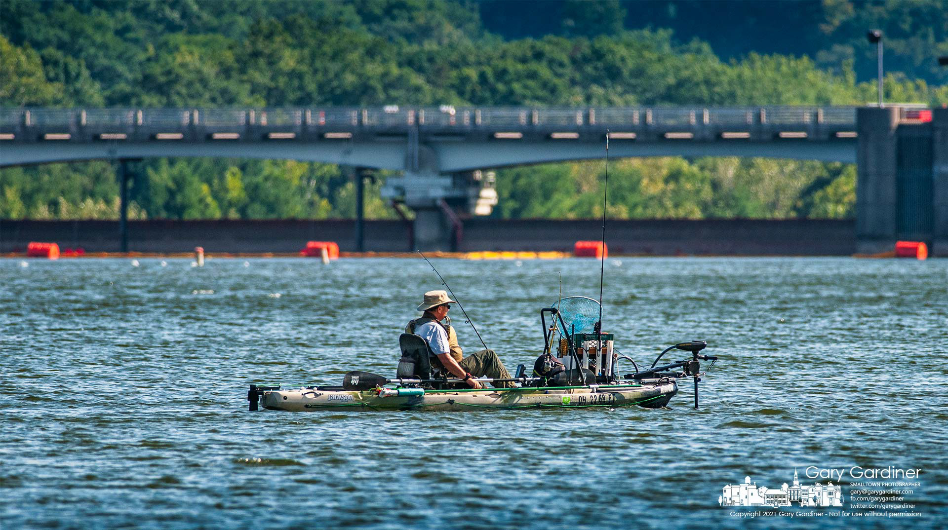 A fisherman shifts his position just above the dam at Hoover Reservoir during a Tuesday afternoon session on the lake. My Final Photo for Sept. 7, 2021.