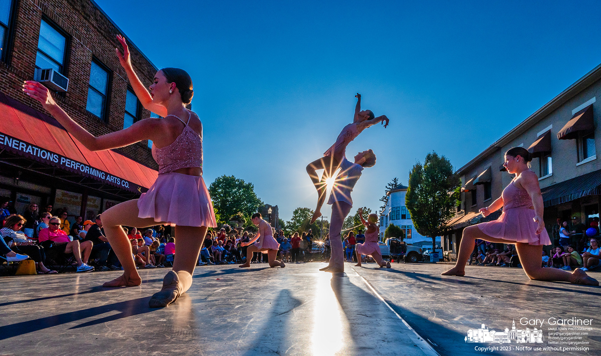Generations dancers perform on West College against the setting sun on the last Fourth Friday of the season and the last day of summer. My Final Photo for September 22, 2023. https://bit.ly/3PPkhII