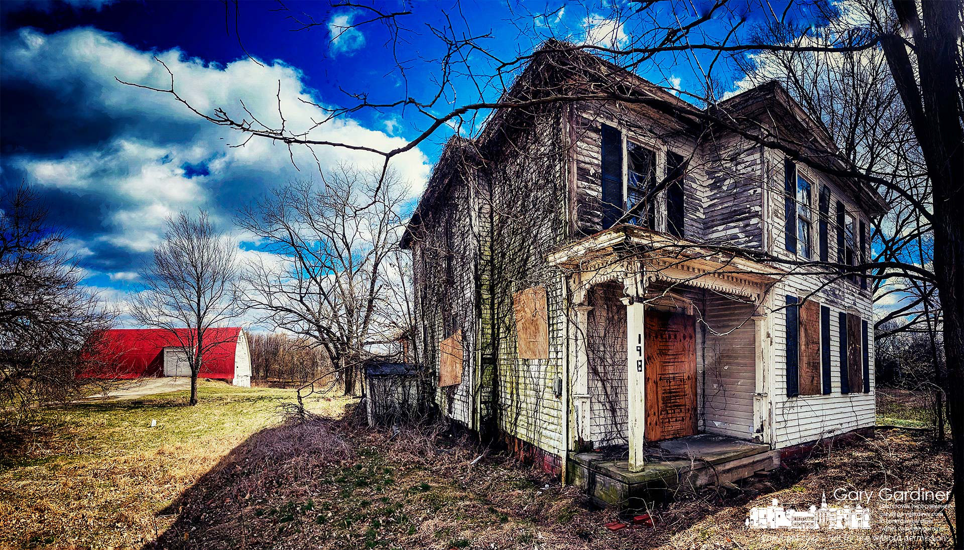 The afternoon sun illuminates the condition of the old farmhouse at the Braun Farm on Cleveland Ave. My Final Photo for March 28, 2022.