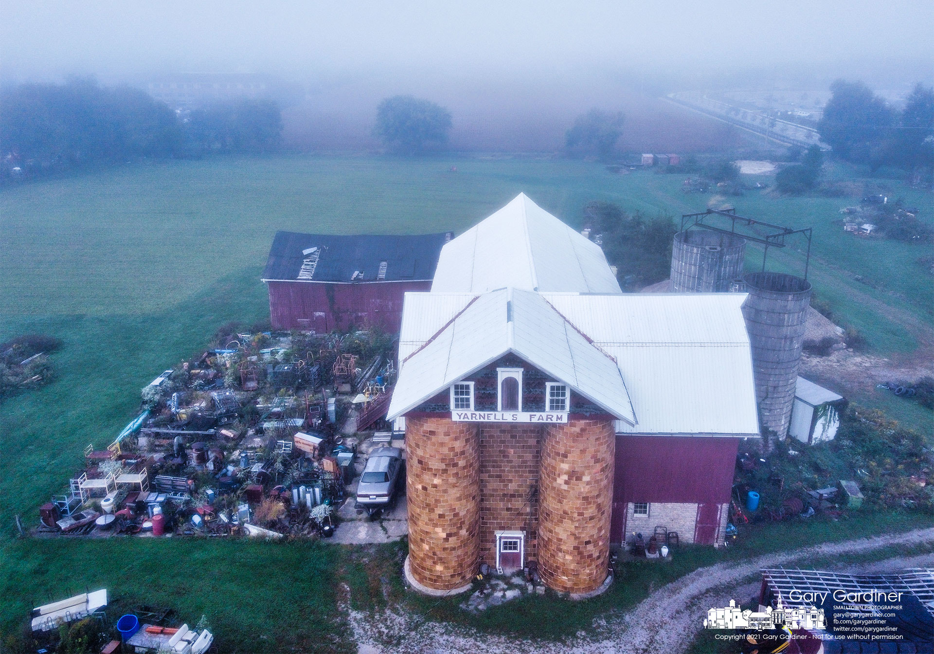 The morning fog obscures the corn nearing harvest on the field behind the Yarnell's Farm barn on Africa Road. My Final Photo for Oct. 5, 2021.