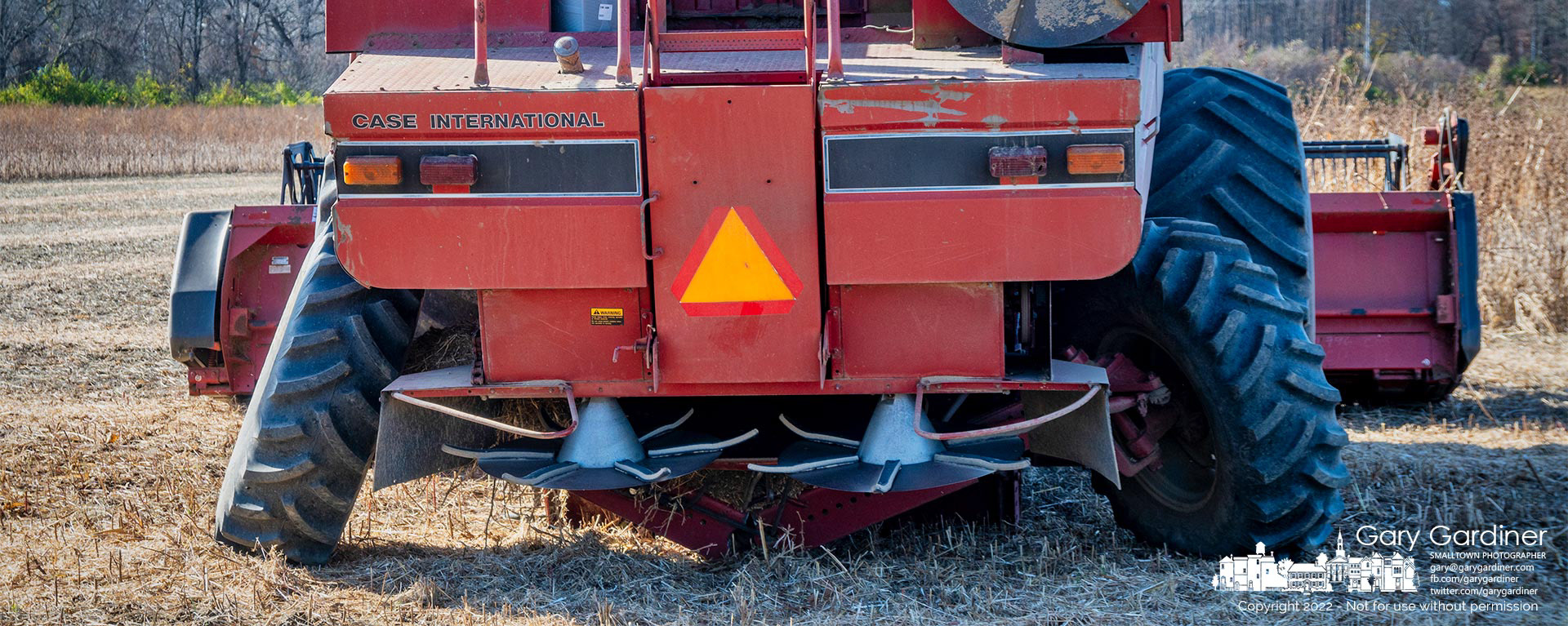Kevin Scott's combine sits at the far end of the Braun Farm soybean field where the rear axle case snapped in half during the harvest. My Final Photo for November 8, 2022.