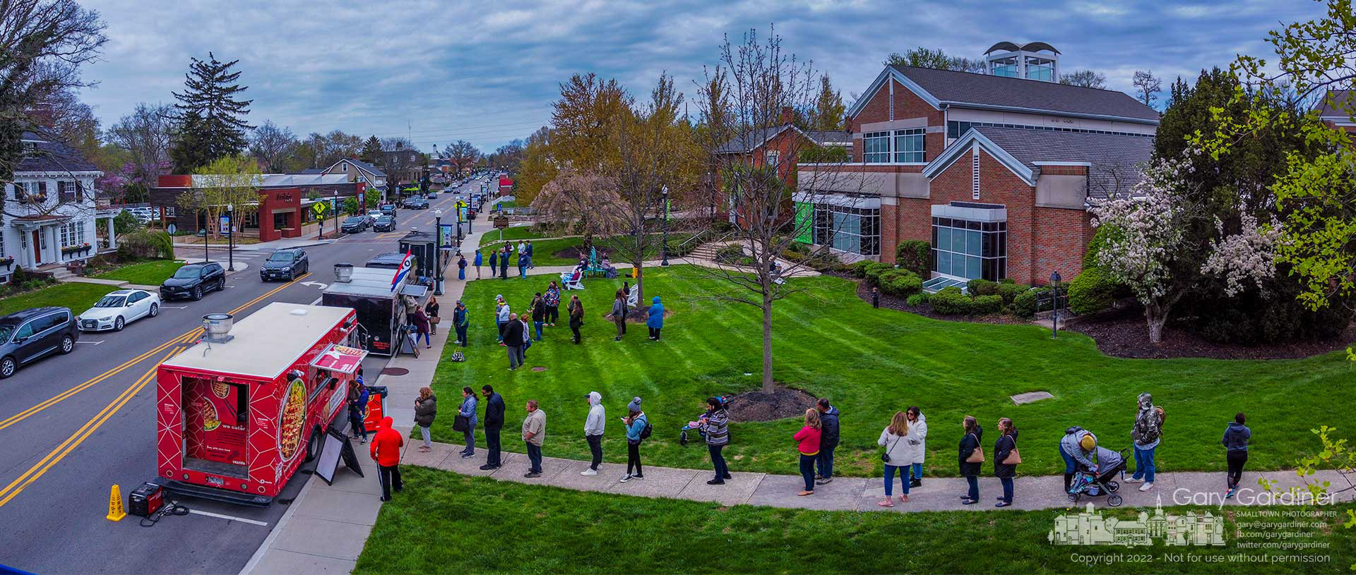 Hungry lunch-goers line up at food trucks lining State Street in front of the Westerville Library for a belated Library Appreciation Week celebration to promote libraries and their workers. My Final Photo for April 27, 2022.