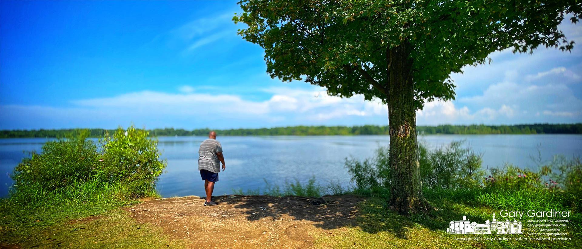 A lone fisherman casts into Hoover Reservoir after an afternoon storm brought rain, high winds, and lightning that cleared other anglers from the lake. My Final Photo for July 8, 2021. 