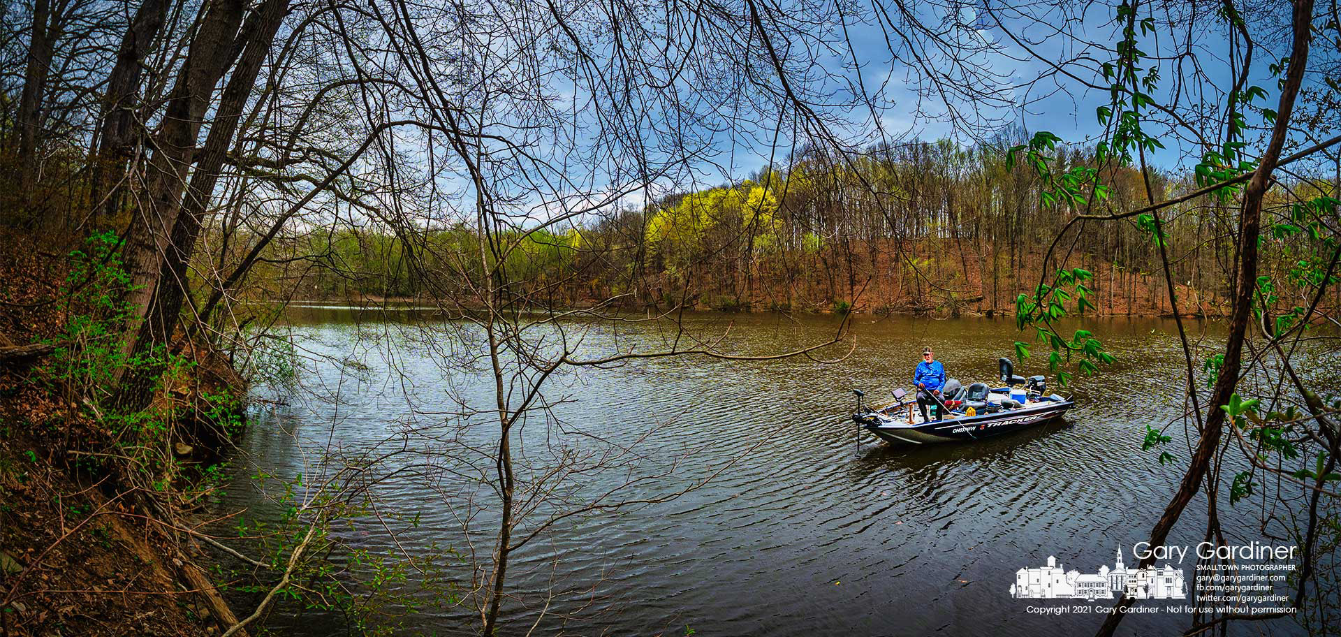 A fisherman drops his bait into an area where it appears the fish have gathered for spawning as he caught his limit of crappies in a short period of time just after his fishing companions left the site. My Final Photo for April 10, 2021.