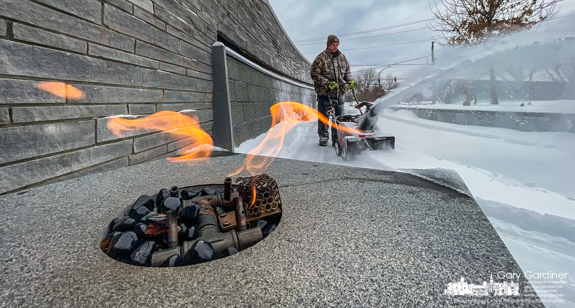 A Westerville Parks crew clears snow from First Responders Park after an overnight storm dropped as much as five inches of the powder. My Final Photo for Feb. 4, 2022.