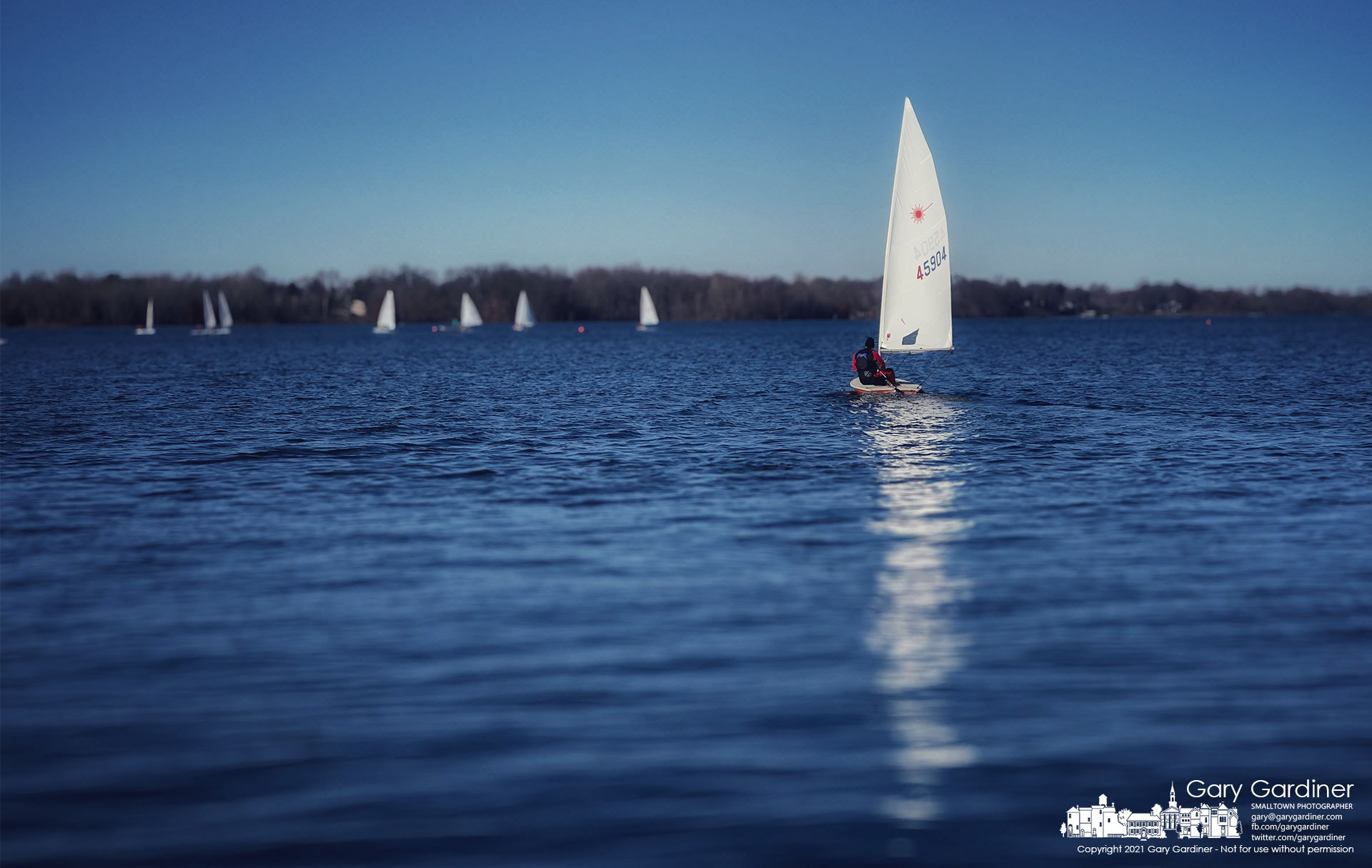A sailor leaves the dock at Hoover Sail club to join the others of his group getting in another weekend competition a little more than a week before the official start of winter and the possibilities of ice on the lake. My Final Photo for Dec. 12, 2021.