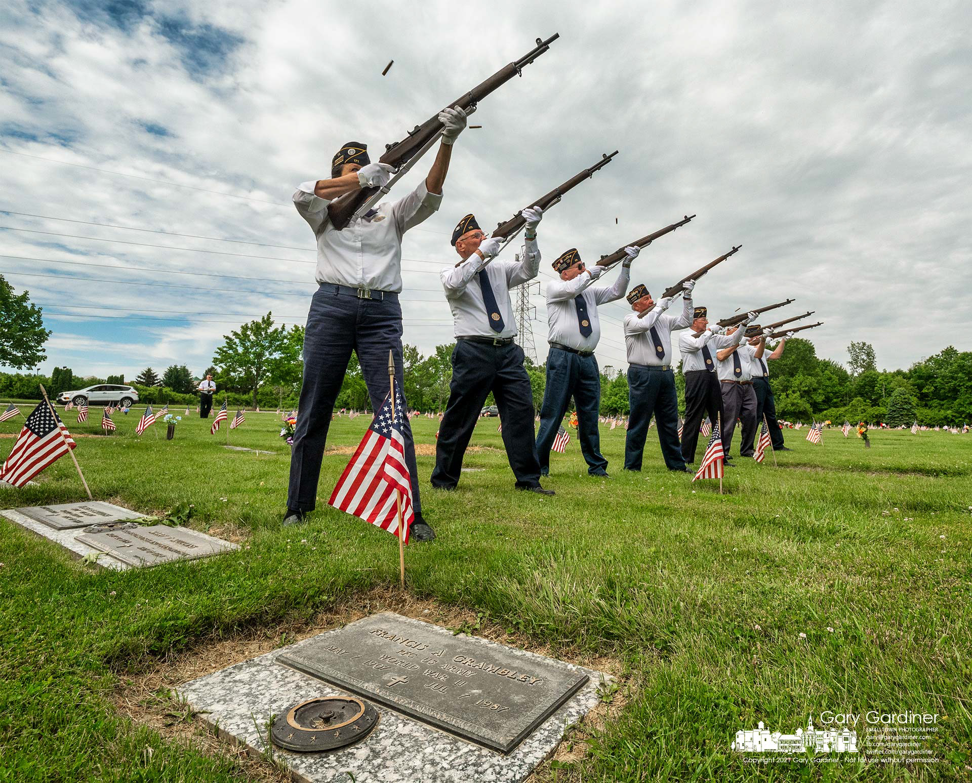 The Westerville American Legion Honor Guard fires a salute during ceremonies at Northlawn Cemetery, one of three cemeteries the veteran group visited on Memorial Day despite not being issued a permit by the city for its annual march and observances. My Final Photo for May 31, 2021.