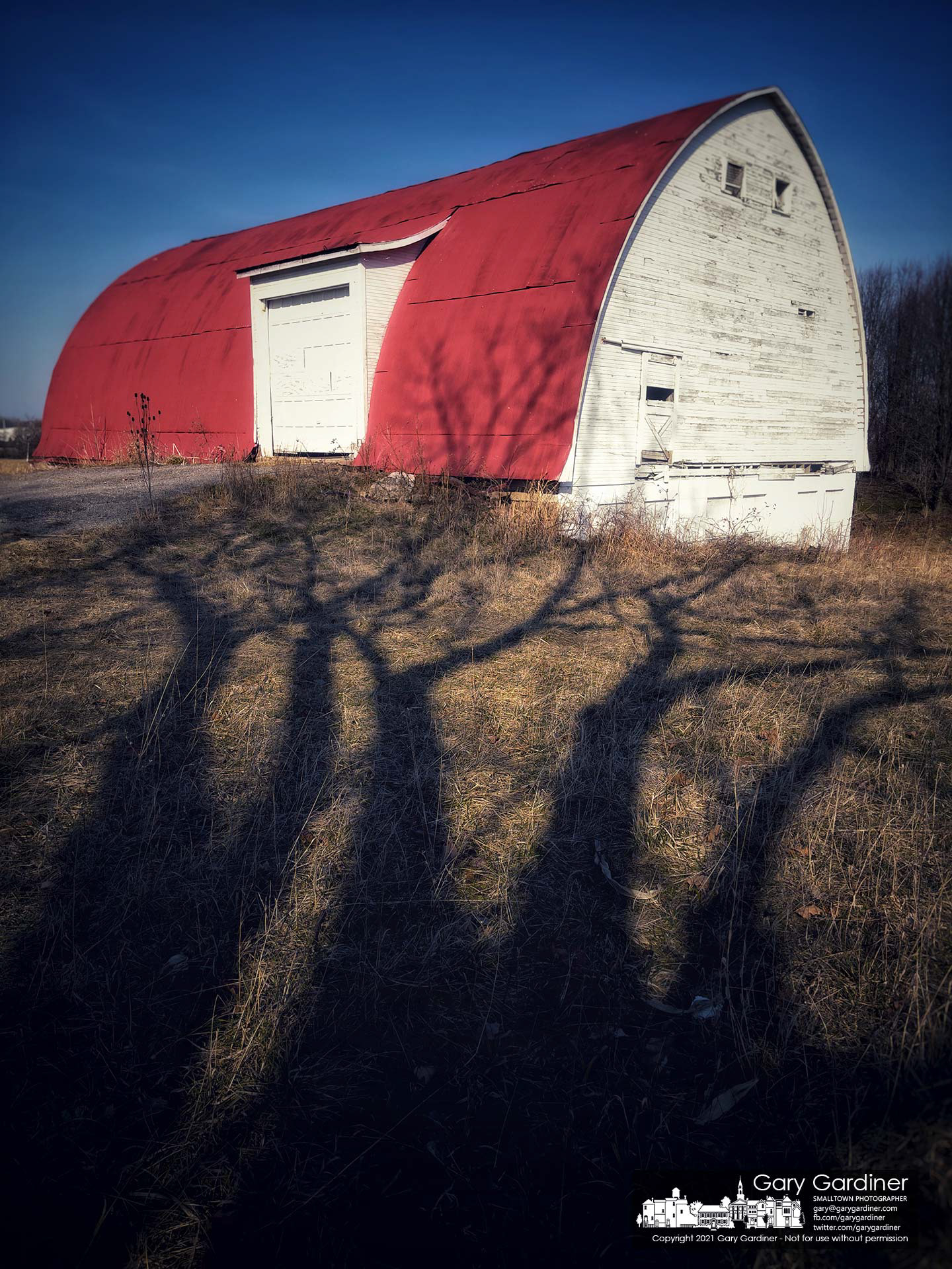 Late winter shadows from a walnut tree stretch themselves toward the barn on the Braun Farm in Westerville. My Final Photo for March 8, 2021.
