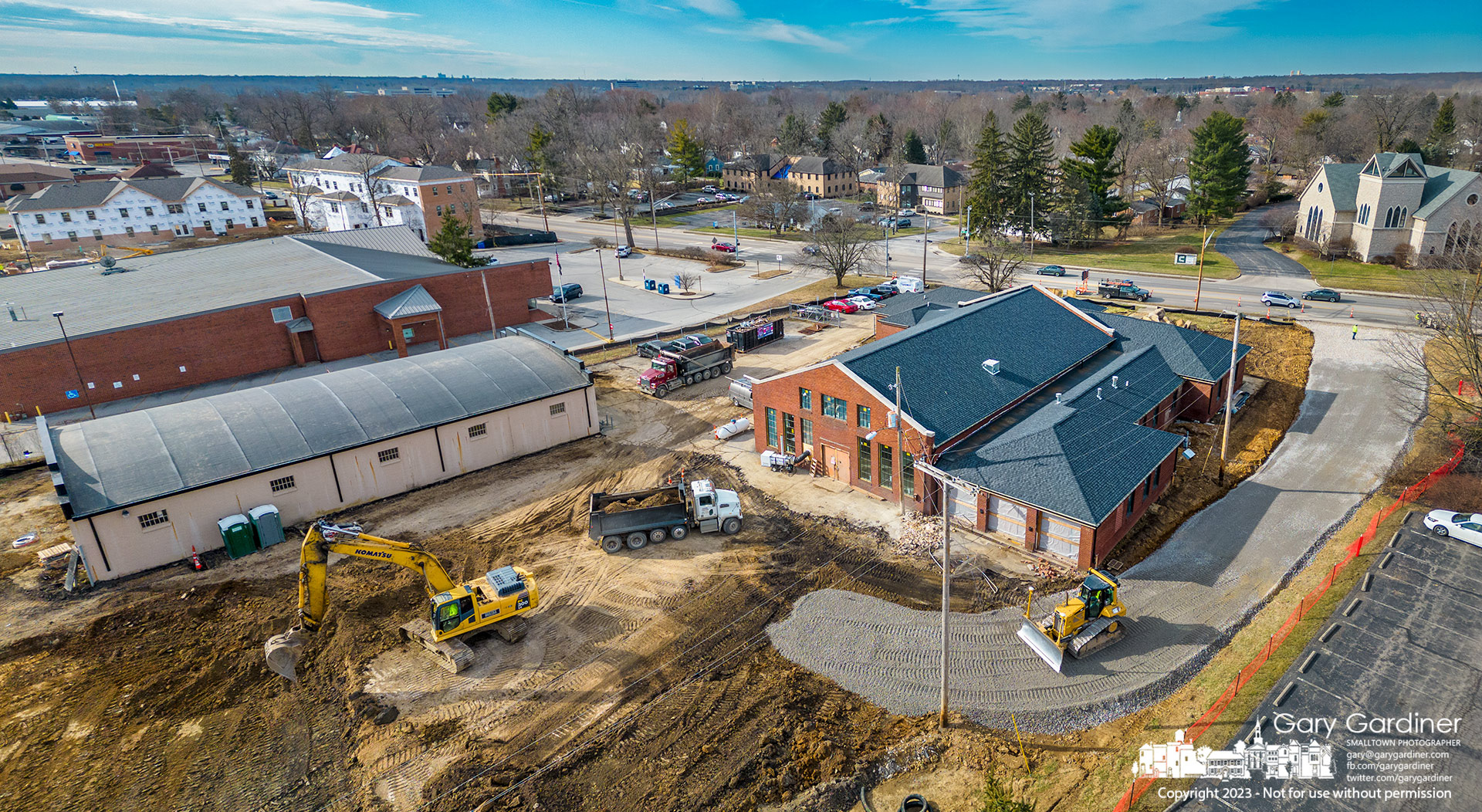 A grading crew builds a new entrance to the old Westerville Armory where CoHatch is building an office center and North High Brewing is expanding its brewery operation into the old warehouse beside what will be the new concrete parking lot. My Final Photo for February 13, 2023.