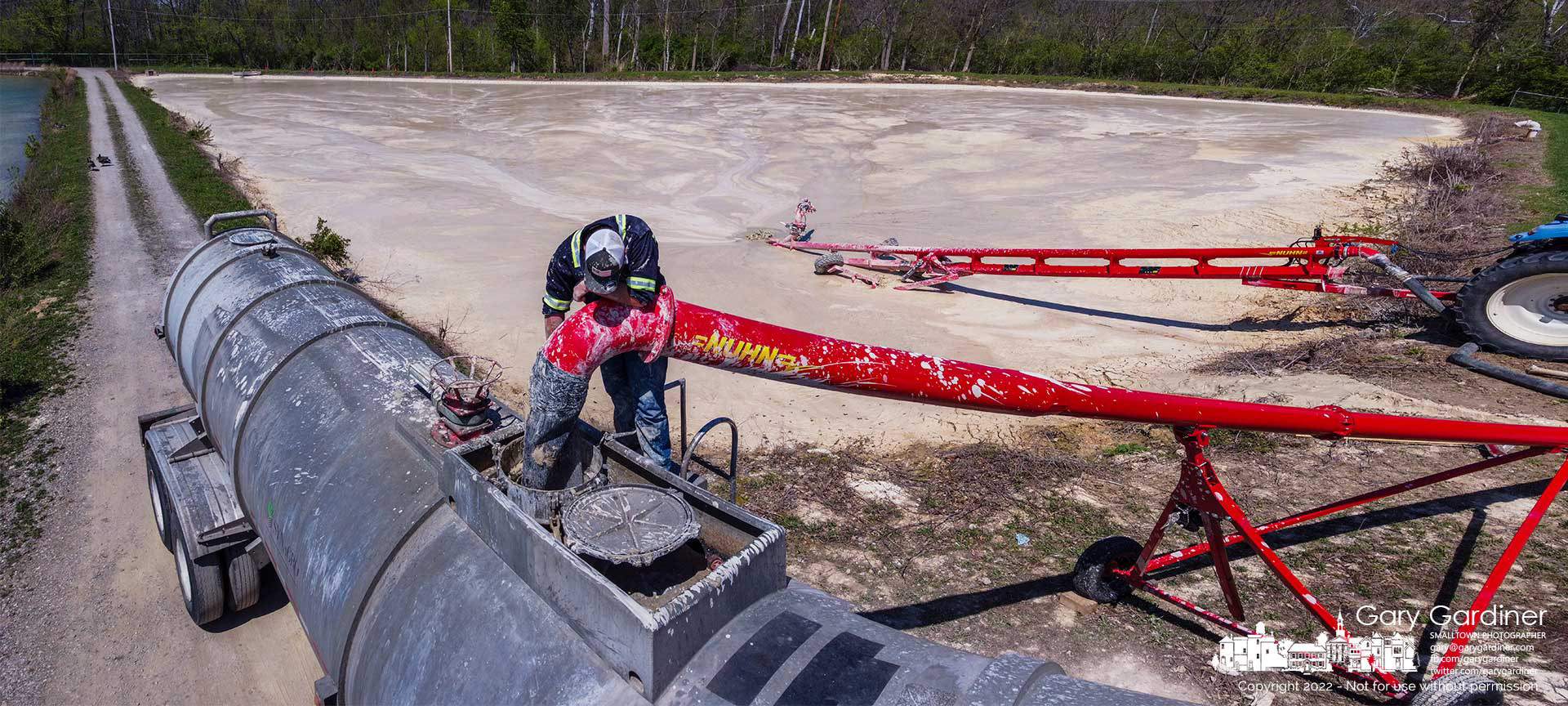 Lime removed during the city's water purification process is pumped from a holding pond into a tanker truck where it will be delivered for spreading on a farm field to increase the pH of the soil for a better yield. My Final Photo for May 2, 2022.