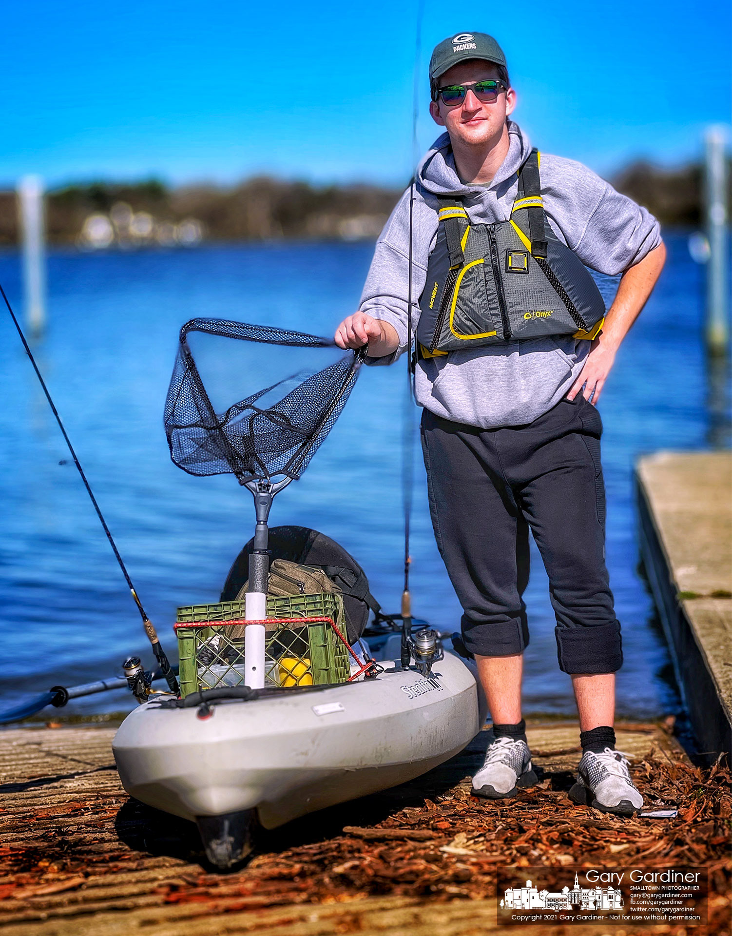 A fisherman poses for a quick photo before launching a borrowed boat on Hoover Reservoir for the first time. My Final Photo for March 27, 2021.