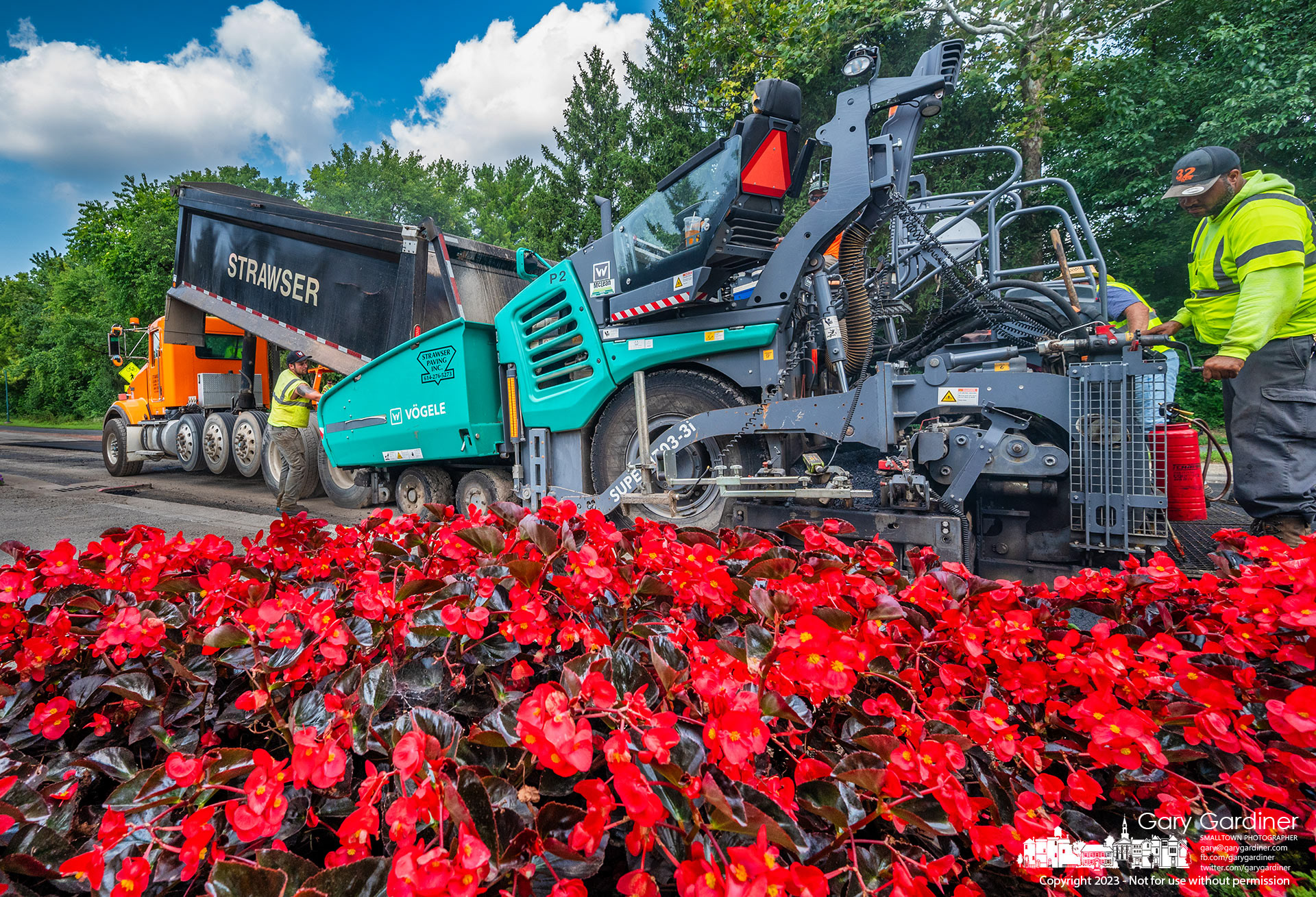 Contractors lay asphalt on Lindimore Way replacing sections of the roadway damaged by fire department vehicles making  90-degree turns at the rear of the main fire station on West Main. My Final Photo for August 21, 2023. https://bit.ly/44k4fL3