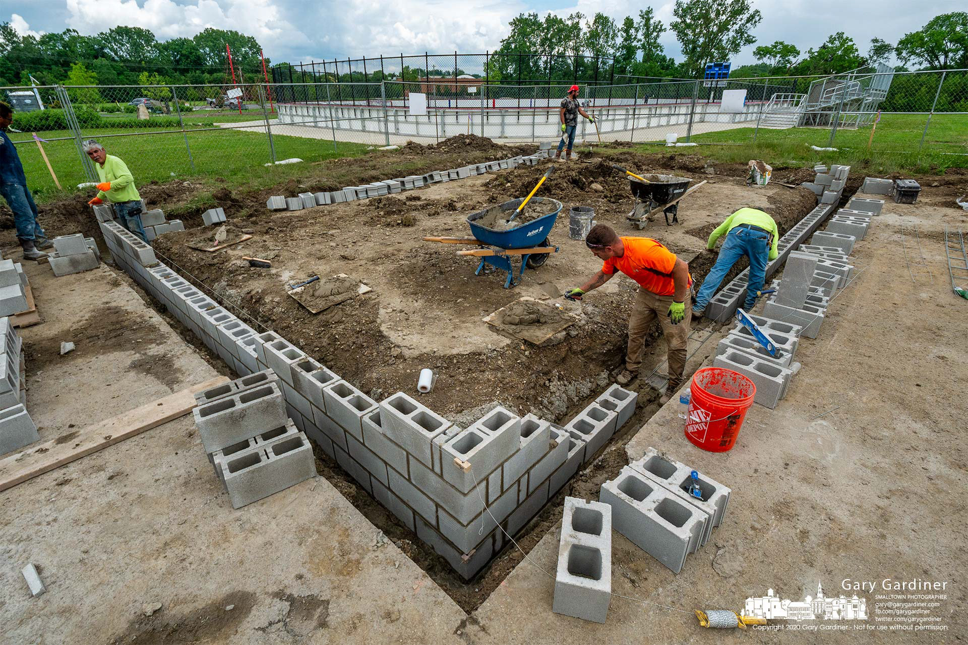 Masons build concrete block walls for a storage and work shed at Alum Creek Park South where the BMX bike path is being upgraded. My Final Photo for June 10, 2021.
