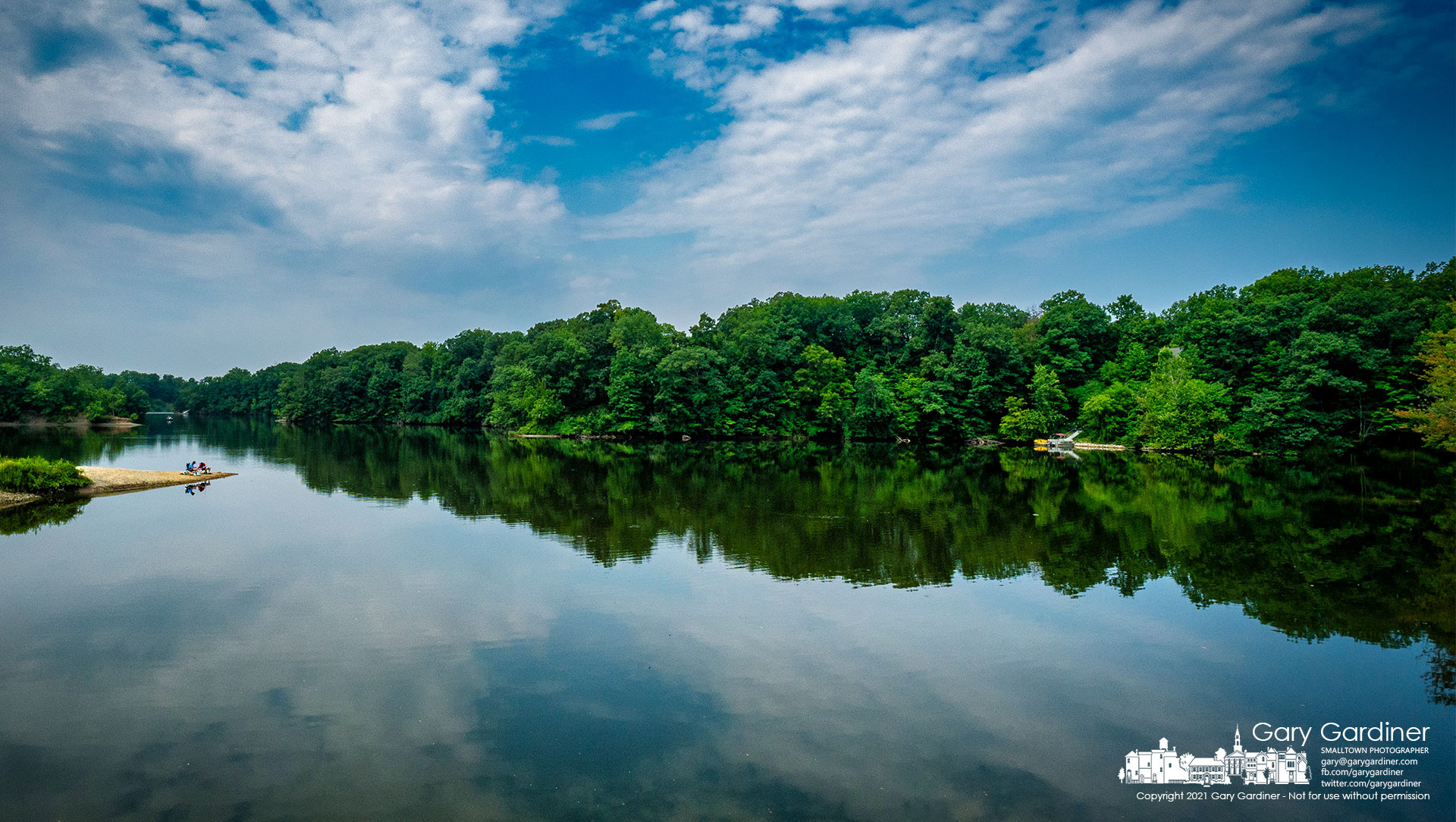 Two men cast their bait into the still waters of Hoover Reservoir on a warm August Saturday afternoon. My Final Photo for Aug. 7, 2021.