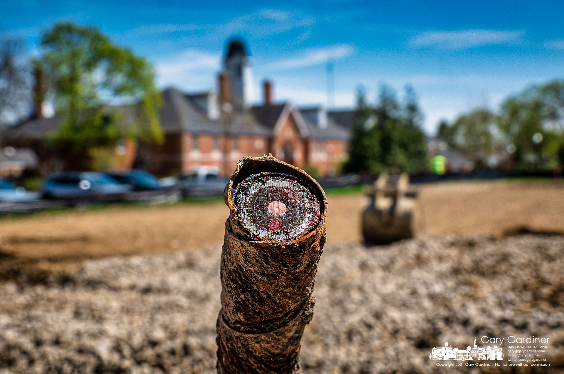 A small section of copper, lead-lined electric cable removed from the edge of the construction site on West College where the city is building a new parking lot b behind city hall. My Final Photo for April 13, 2021.