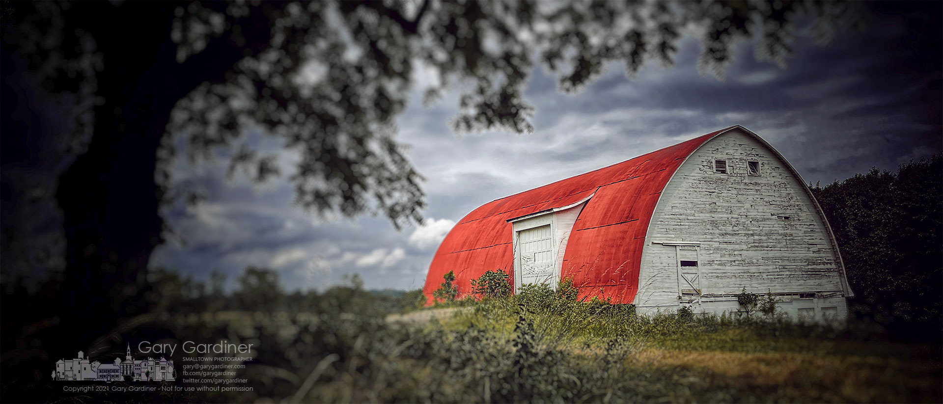 The barn at the Braun Farm sits under grey skies following an afternoon thunderstorm. My Final Photo for June 21, 2021.