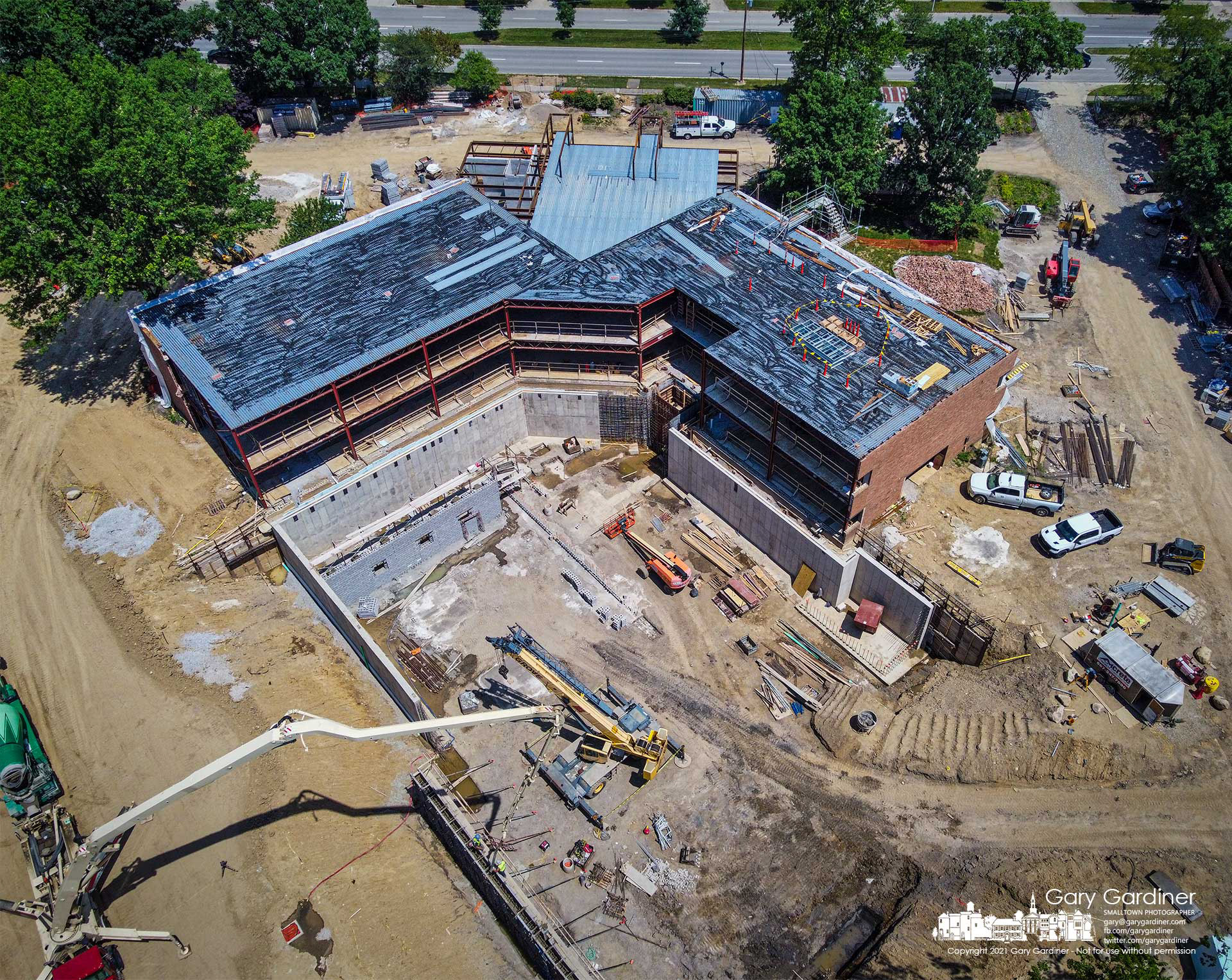 Workers pump concrete into forms that will become the exterior walls of the basement area of the new Westerville Police and Mayors Court which will include a firing range and secure area for the transfer of prisoners into the court system. My Final Photo for June 23, 2021.