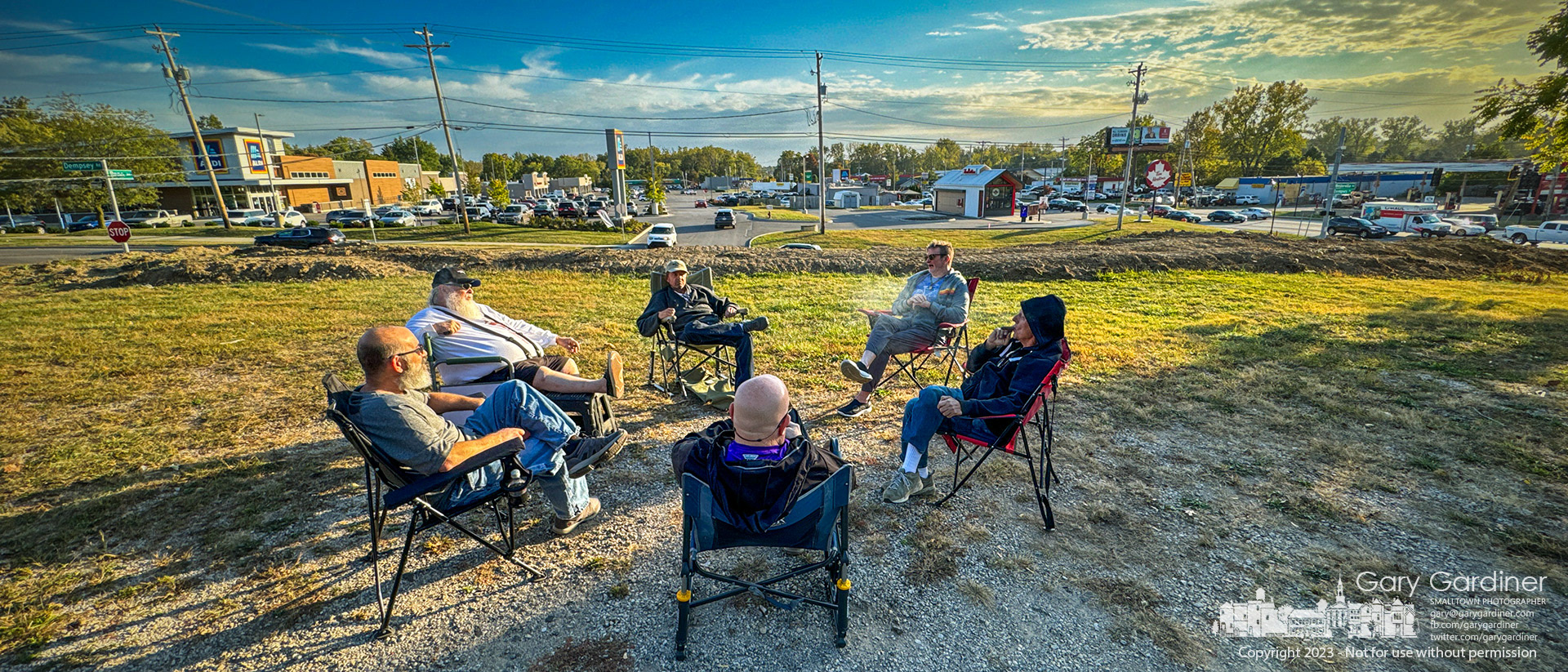 A small group of friends and neighbors gather on the hilltop overlooking Glengary Shopping Center on Westerville Road where weather permitting they share stories of their friendship and their long history in central Ohio. My Final Photo for October 11, 2023. https://bit.ly/46IR5J4