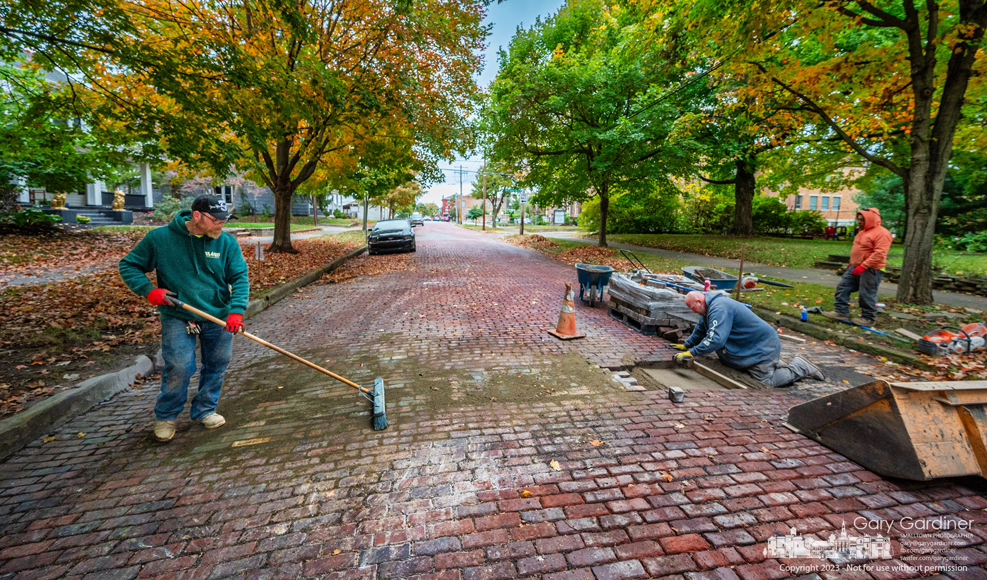 Street Sweeper - Bricks are returned to West College Ave. after new water lines were laid beneath the iconic street in Uptown Westerville. My Final Photo for October 16, 2023. https://bit.ly/45xhWH1