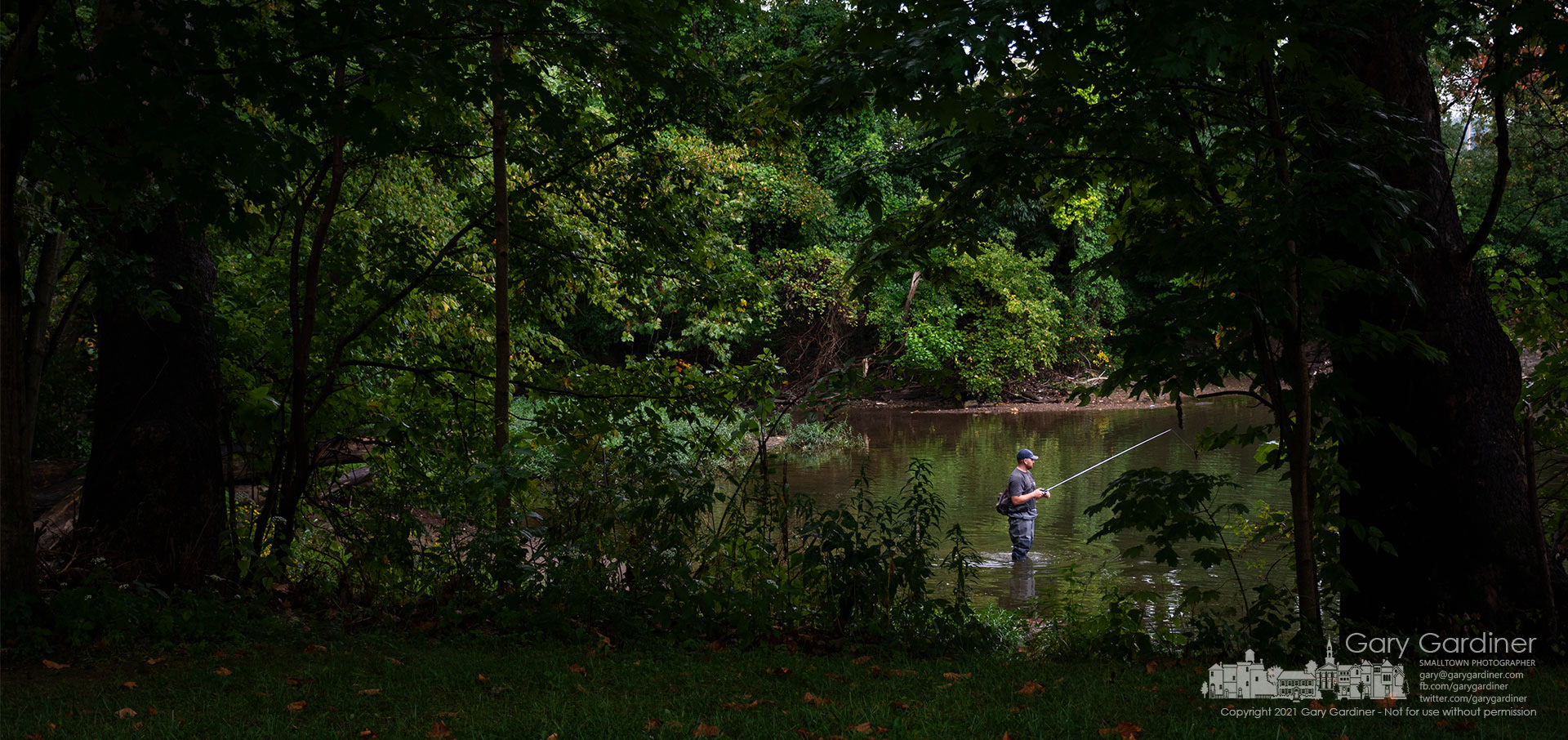 A fisherman tries his luck below the spillway for the Westerville Alum Creek dam during rain showers Tuesday afternoon. My Final Photo for Sept. 15, 2021. 