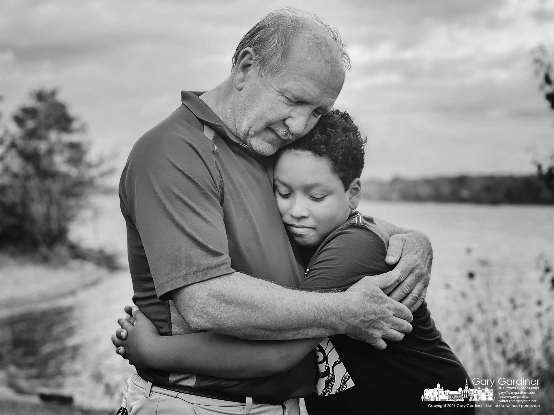 Grandfather and grandson embrace at the end of an afternoon enjoying themselves on the shores of Hoover Reservoir at Red Bank Park. My Final Photo for Oct. 15, 2021.