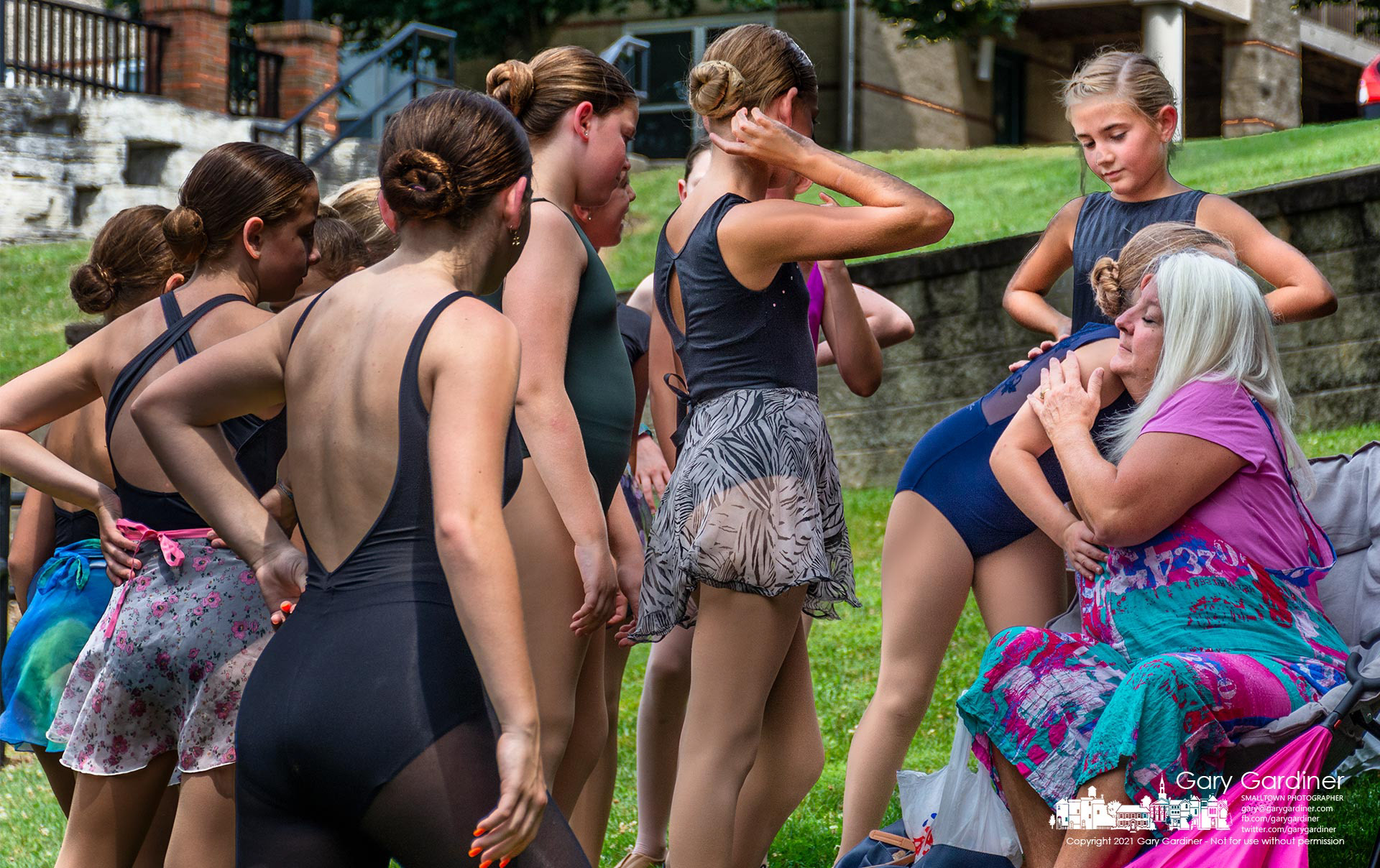 Angie Haver receives hugs from Generations dancers at the Alum Creek Amphitheater after their performance marking the end of summer camp which Haver didn't get to help teach as she recovered from Covid. My Final Photo for Aug. 6, 2021.