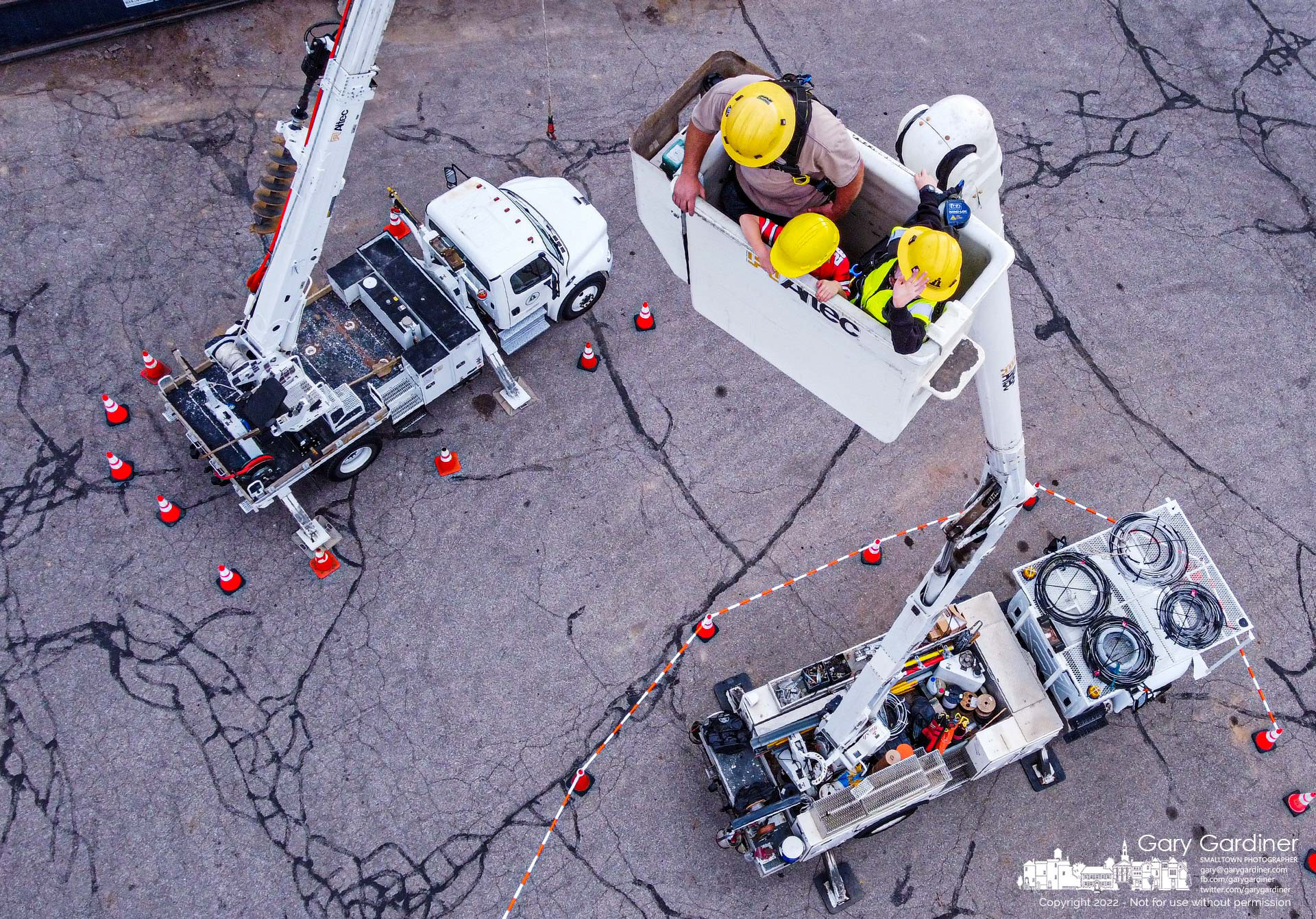 Two youngsters get a bird's-eye view of the city when they are raised to full extension of a city electric bucket truck during Public Power Open House where the city demonstrated it equipment. My Final Photo for October 6, 2022.