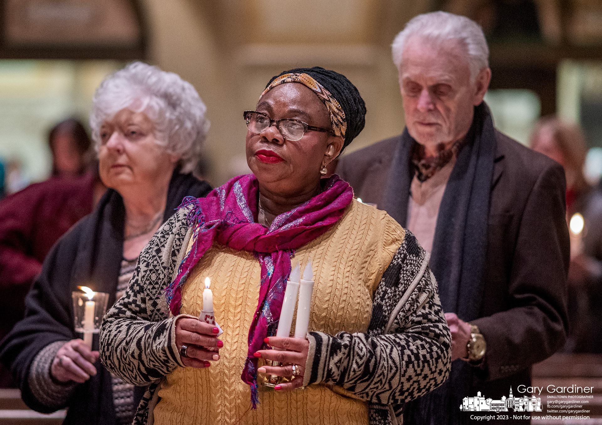 St. Paul the Apostle Catholic Church parishioners hold candles during services Thursday night blessing their Easter candles on the Feast of the Presentation of Jesus Christ in the Temple. My Final Photo for February 2, 2023. 