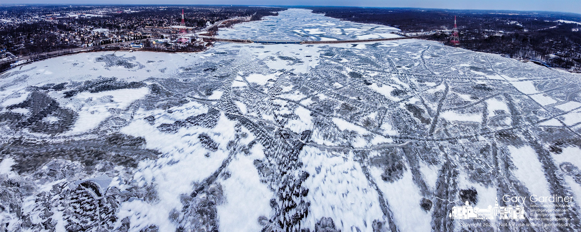 Cracks, fissures, and open patches of water dot the nearly frozen surface of Hoover Reservoir after record low temperatures the last half of the month. My Final Photo for Jan. 31, 2022.
