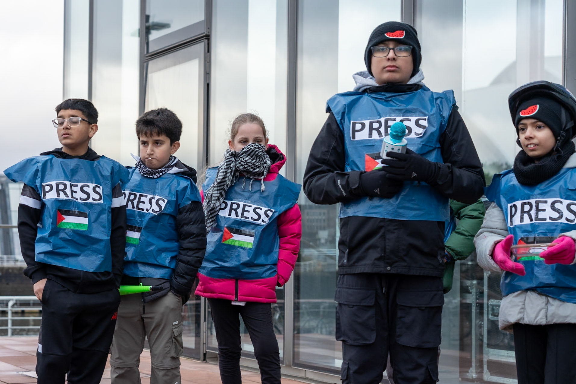 Glasgow, Scotland, UK. 20th January, 2024. Pro Palestine rally and protest outside BBC Scotland Headquarters in Glasgow involving a re-enactment of the killing of children and journalists in Gaza. Credit: R.Gass/Alamy Live News