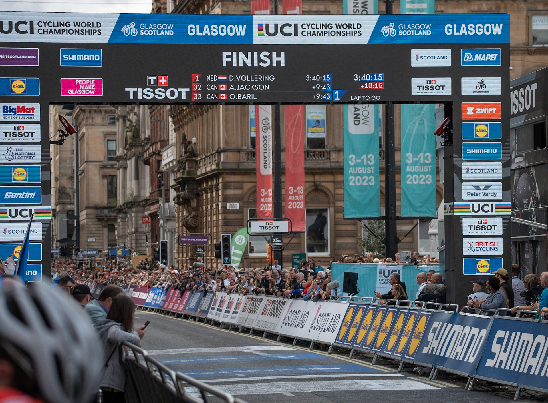 Glasgow, Scotland, UK. 13th August 2023. UCI World Championships – Lotte Kopecky of Belgium wins the Women’s Elite Road Race Road Race from Loch Lomond to Glasgow ending with 6 laps of the city centre circuit. Credit R.Gass/Alamy Live News