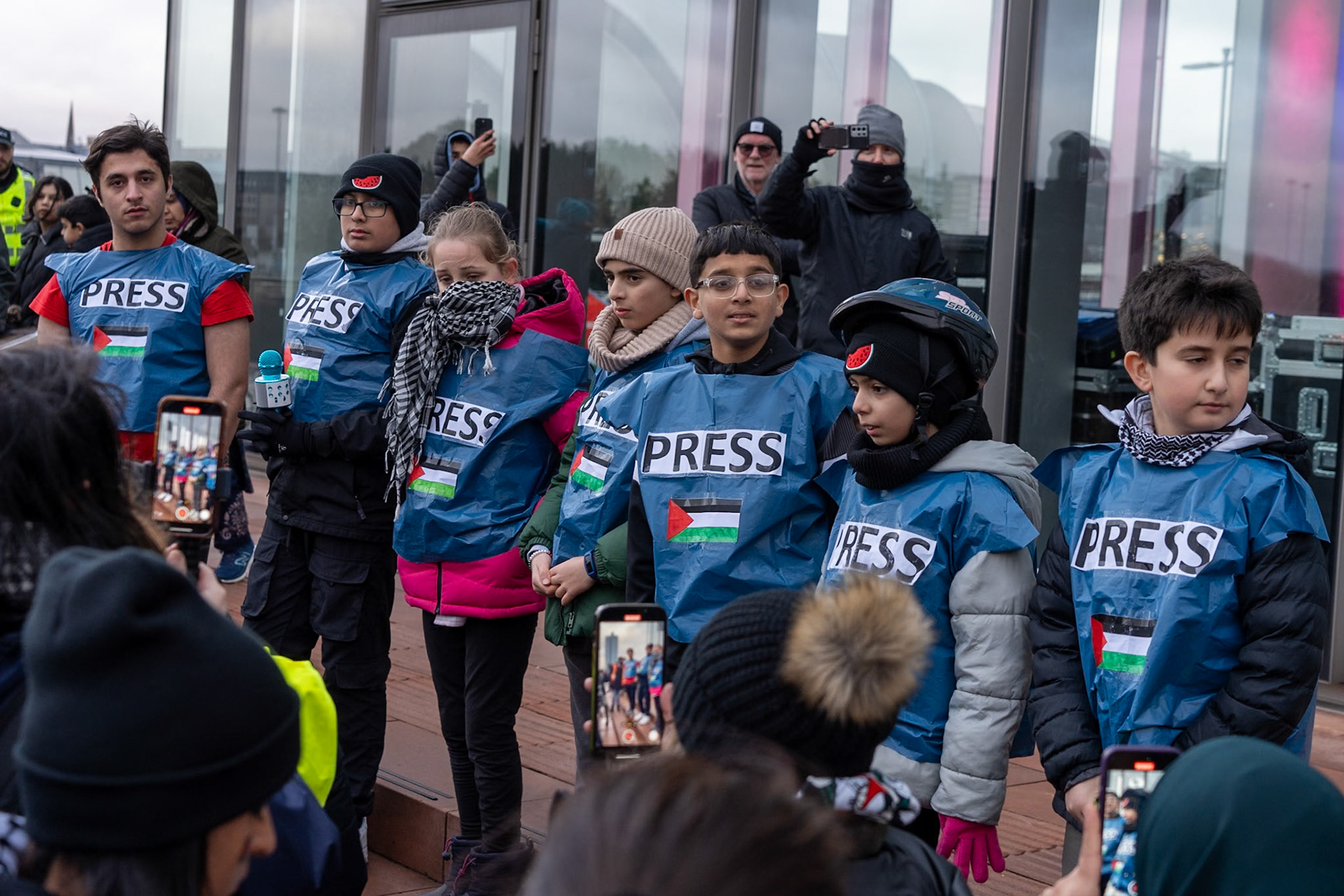 Glasgow, Scotland, UK. 20th January, 2024. Pro Palestine rally and protest outside BBC Scotland Headquarters in Glasgow involving a re-enactment of the killing of children and journalists in Gaza. Credit: R.Gass/Alamy Live News