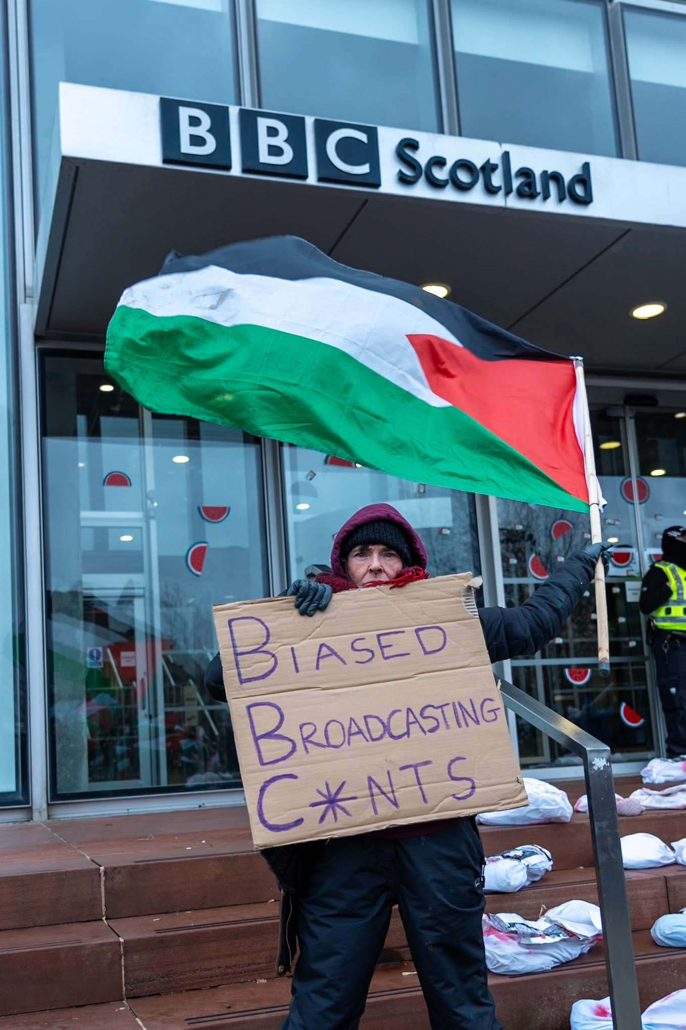 Glasgow, Scotland, UK. 20th January, 2024. Pro Palestine rally and protest outside BBC Scotland Headquarters in Glasgow involving a re-enactment of the killing of children and journalists in Gaza. Credit: R.Gass/Alamy Live News