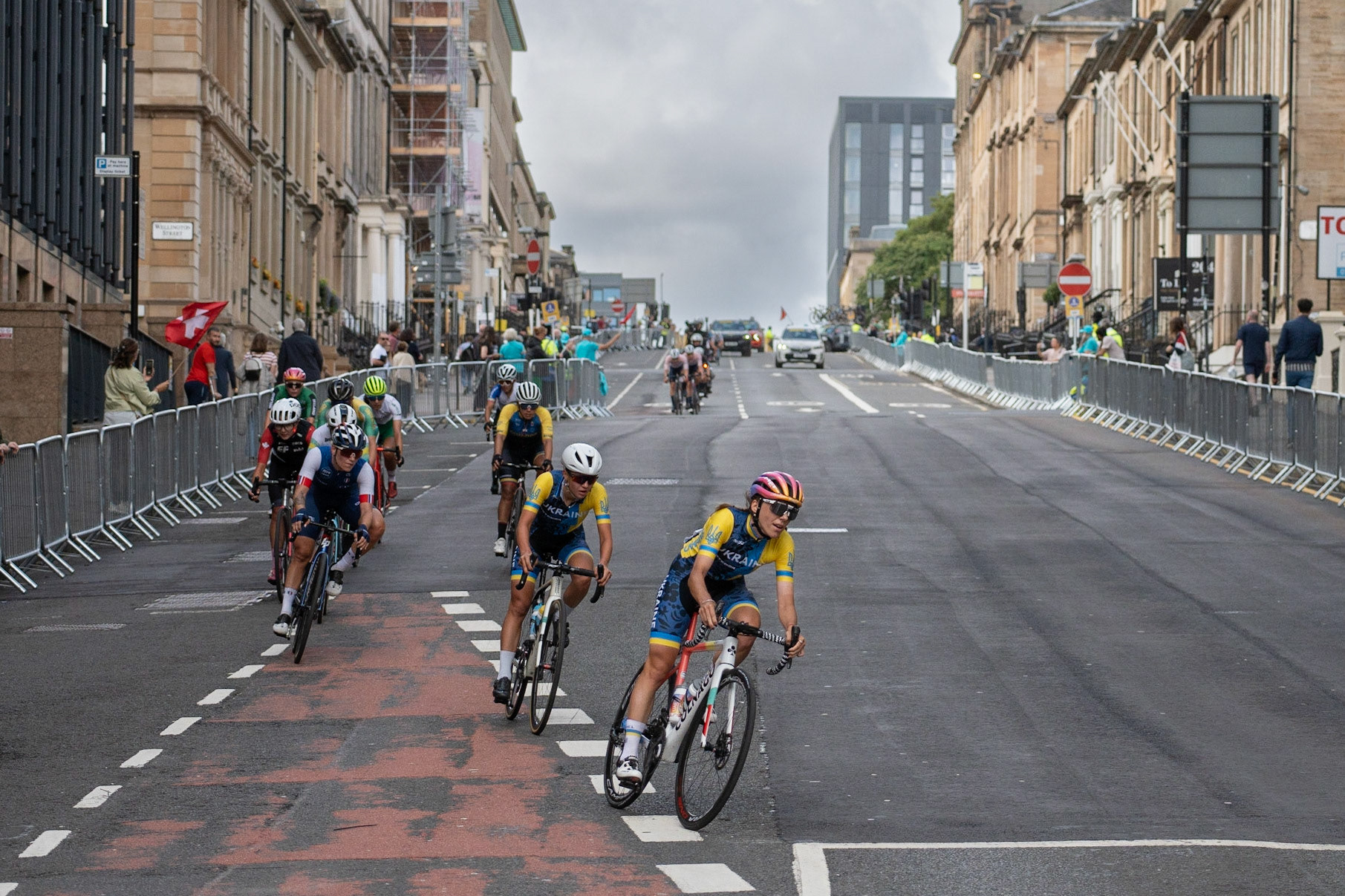 Glasgow, Scotland, UK. 13th August 2023. UCI World Championships – Lotte Kopecky of Belgium wins the Women’s Elite Road Race Road Race from Loch Lomond to Glasgow ending with 6 laps of the city centre circuit. Credit R.Gass/Alamy Live News