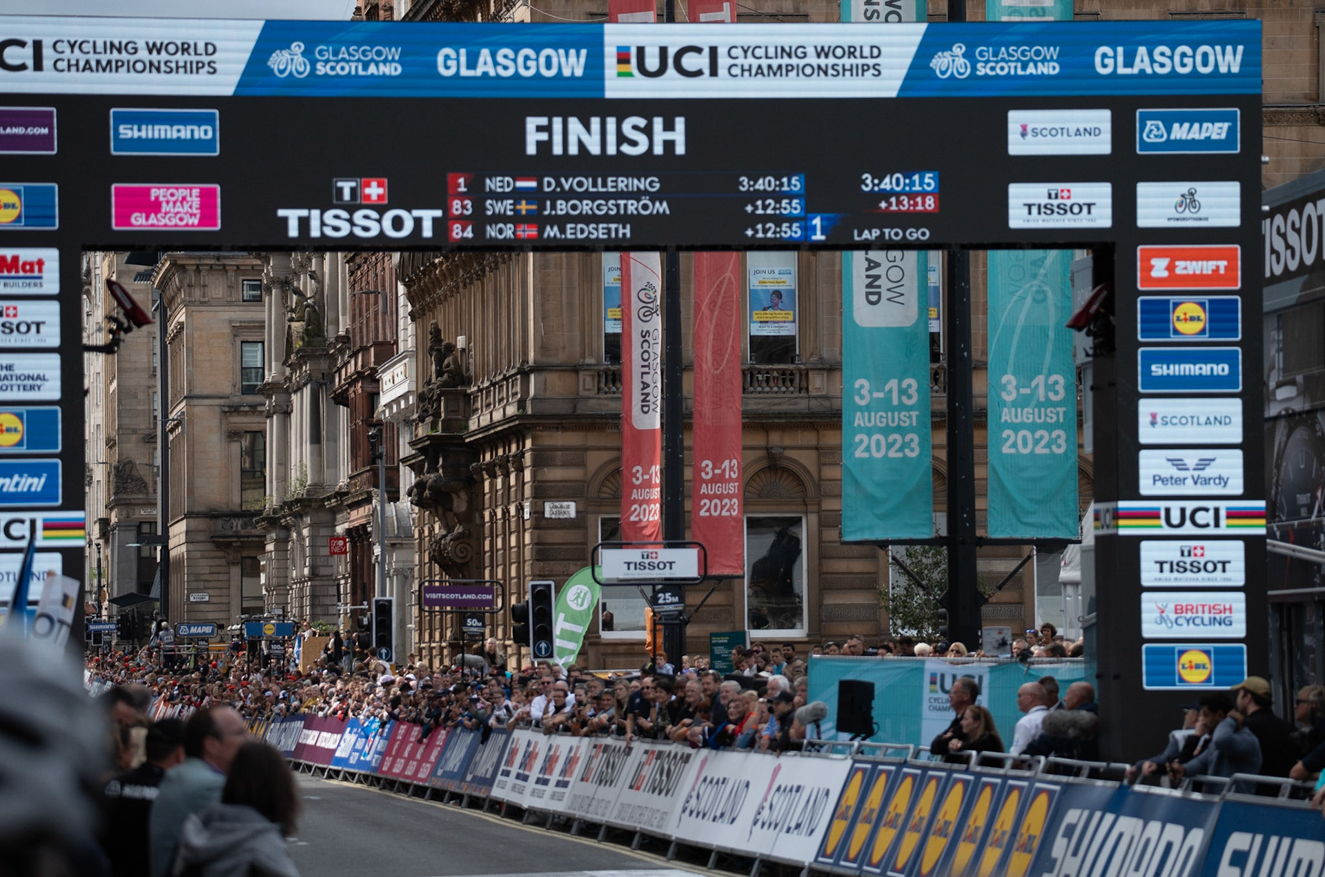 Glasgow, Scotland, UK. 13th August 2023. UCI World Championships – Lotte Kopecky of Belgium wins the Women’s Elite Road Race Road Race from Loch Lomond to Glasgow ending with 6 laps of the city centre circuit. Credit R.Gass/Alamy Live News