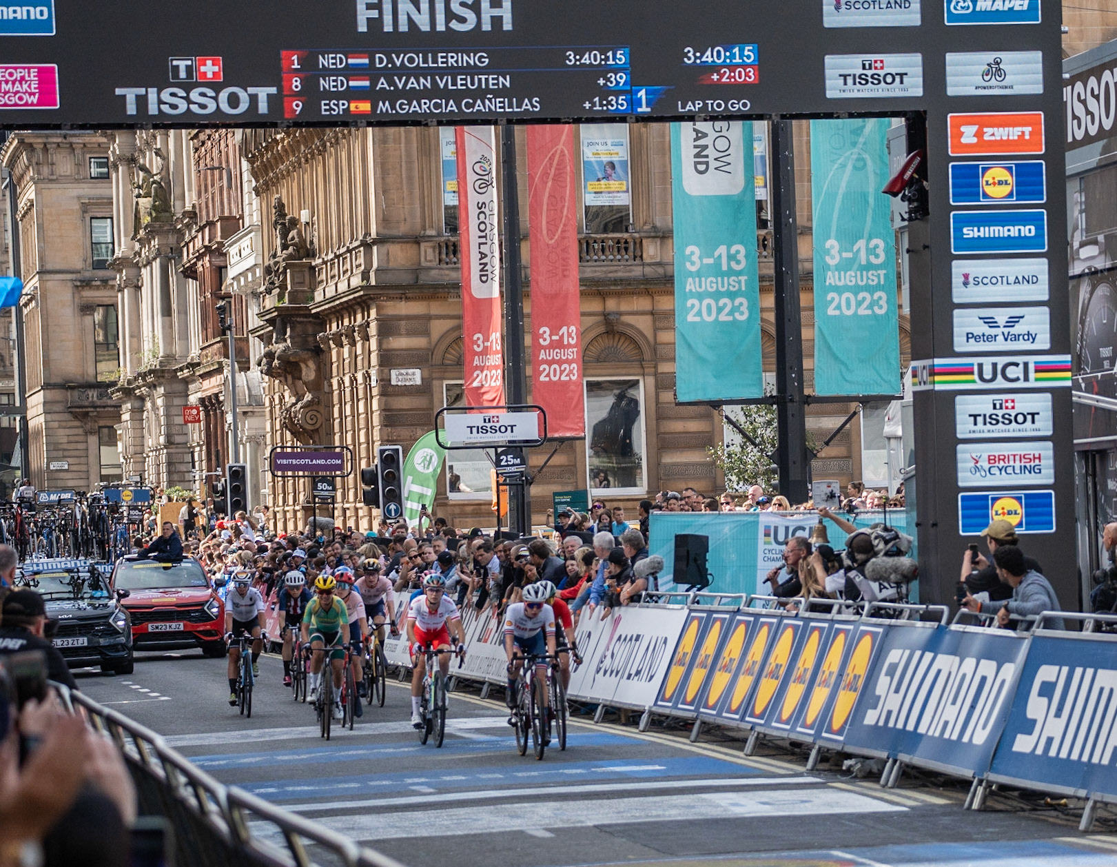 Glasgow, Scotland, UK. 13th August 2023. UCI World Championships – Lotte Kopecky of Belgium wins the Women’s Elite Road Race Road Race from Loch Lomond to Glasgow ending with 6 laps of the city centre circuit. Credit R.Gass/Alamy Live News