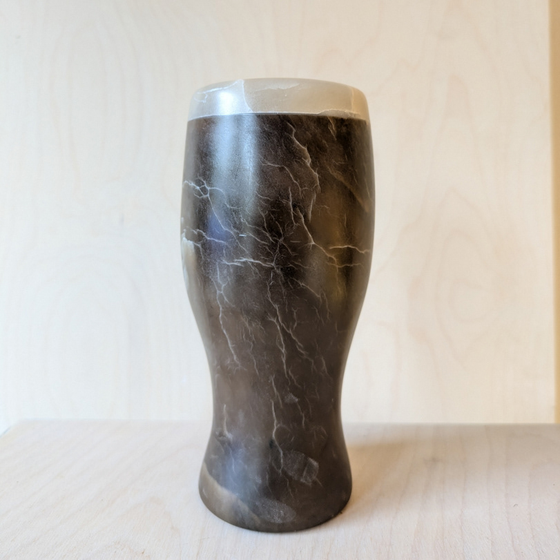 Pint of Guinness in brown and white alabaster