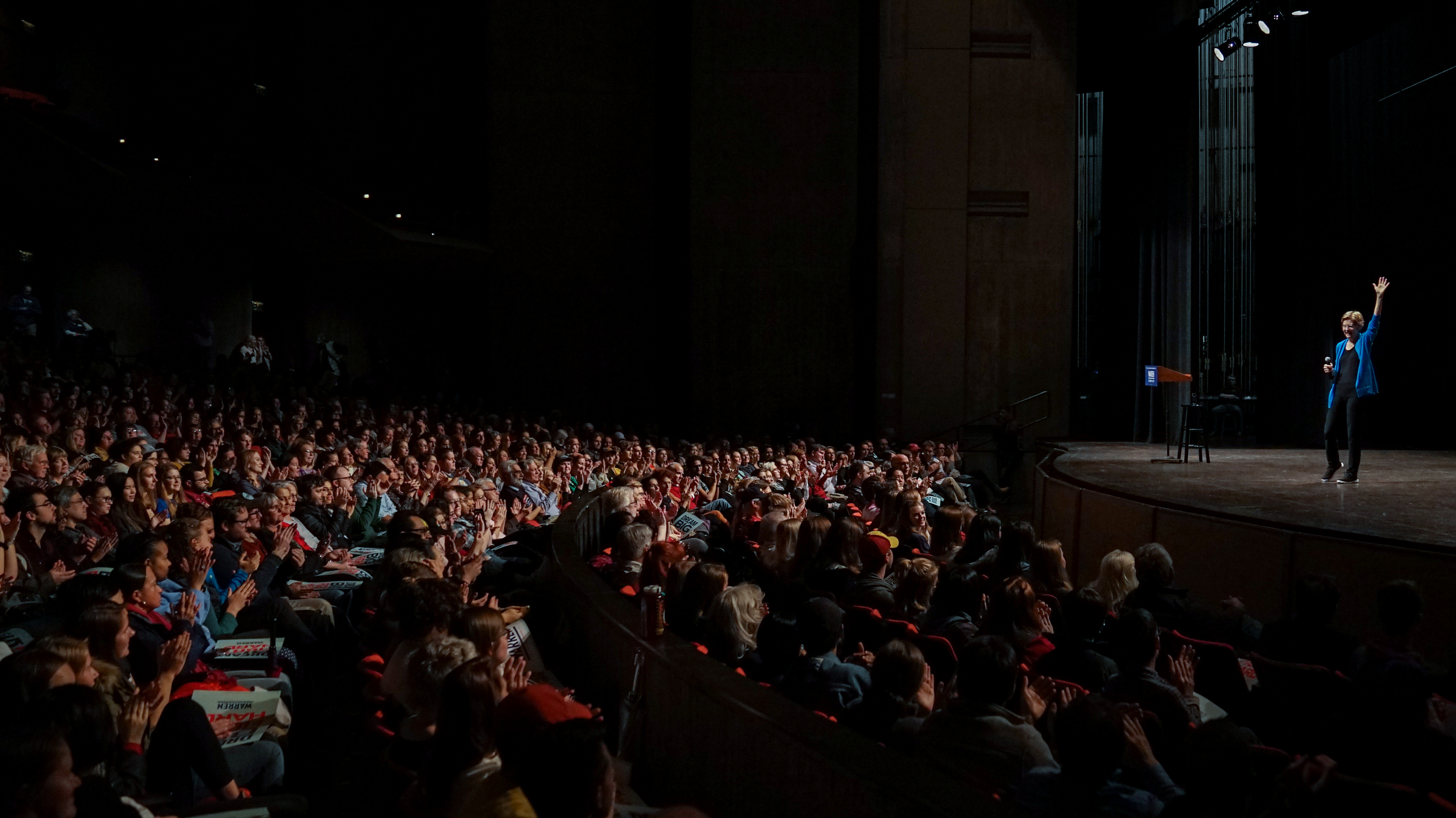 Senator Elizabeth Warren waves to the crowd during a town hall event on October 21, 2019 at Iowa State University in Ames, Iowa.