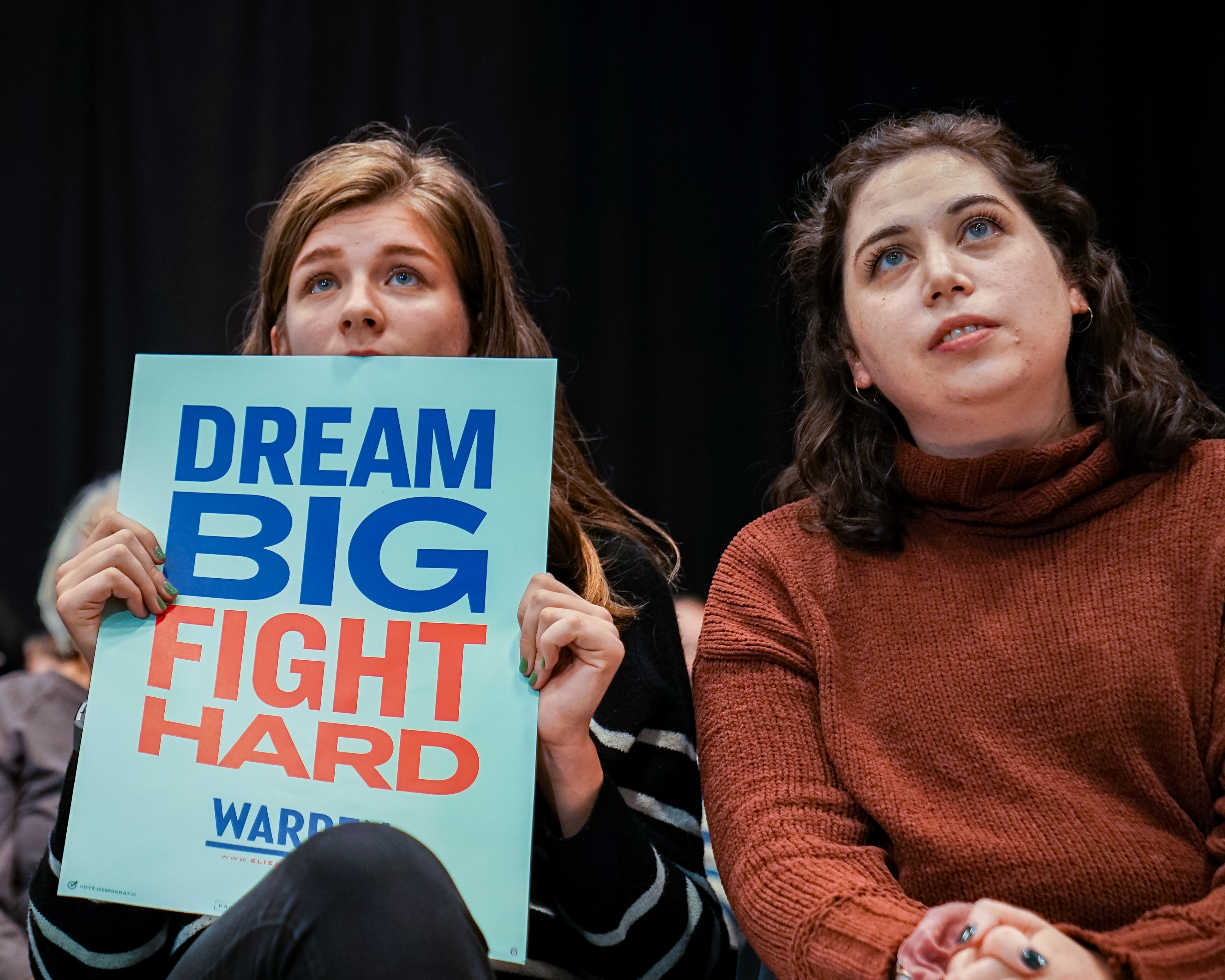 Young female supporters of Senator Elizabeth Warren listen during a town hall event on October 20, 2019 at Drake University in Des Moines, Iowa.