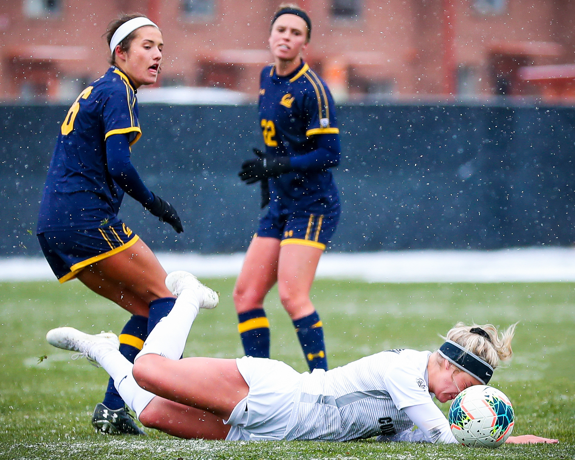 Katie Joella #17 of the University of Colorado Boulder Buffaloes falls and hits her head on the ball during a game against the University of California Berkeley Golden Bears on October 27, 2019 at Kittredfe Field in Boulder, Colorado. The Buffaloes tied the Golden Bears 1-1 after two periods of overtime.