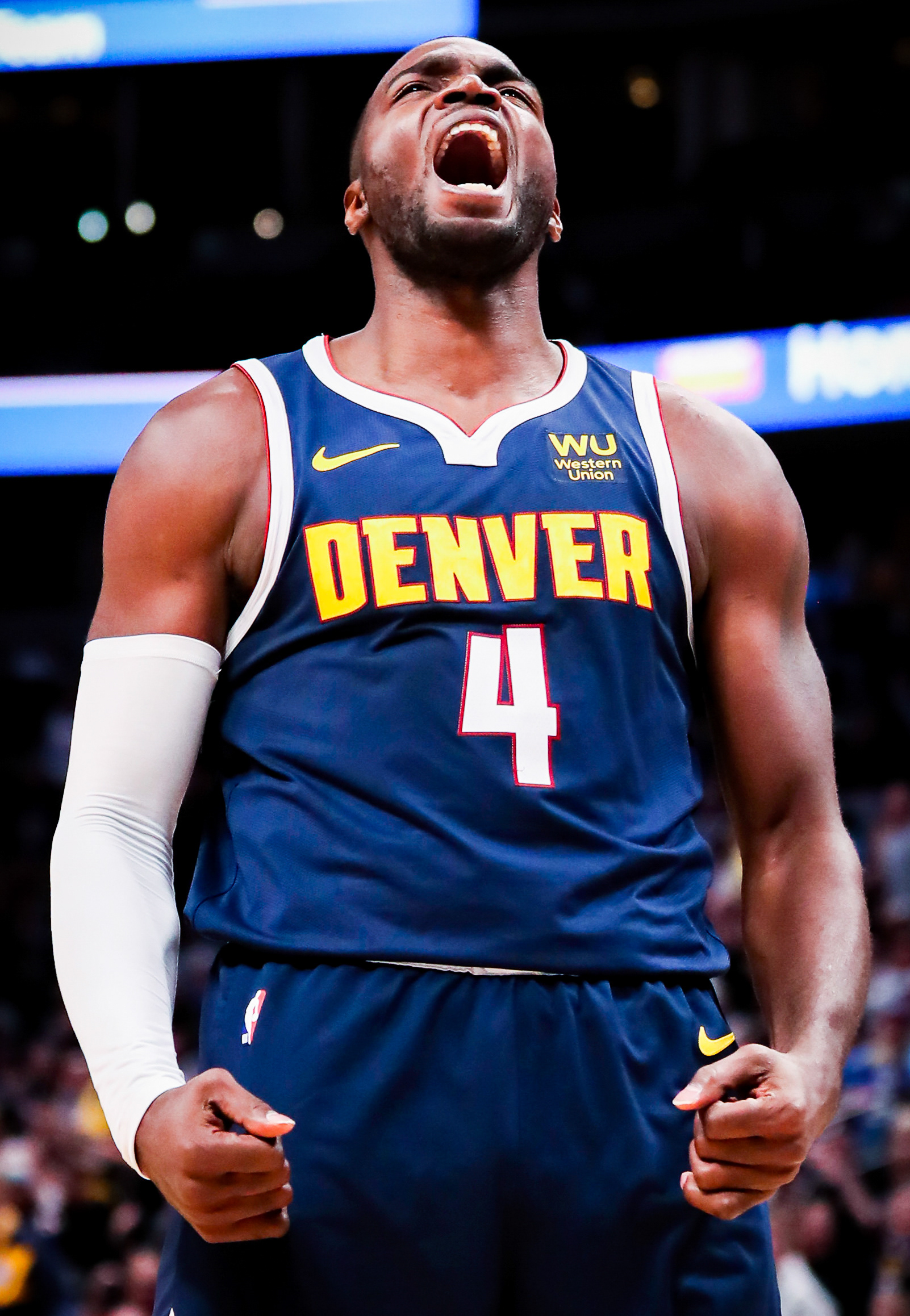 Paul Millsap #4 of the Denver Nuggets reacts to dunking a rebound during the fourth quarter of a game against the Dallas Mavericks at Pepsi Center on October 29, 2019 in Denver, Colorado. The Mavericks defeated the Nuggets 109-106.