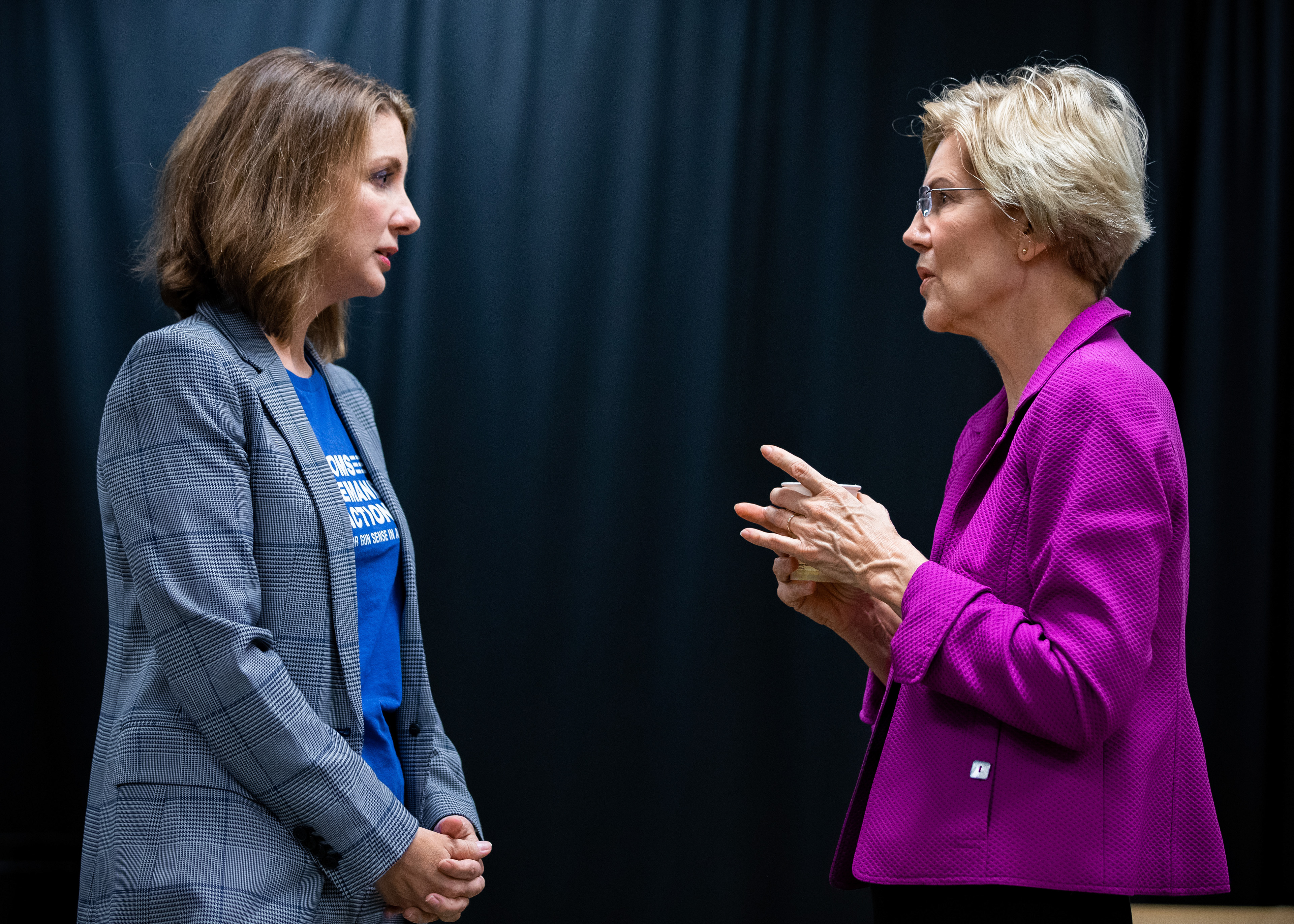 Senator Elizabeth Warren discusses gun violence backstage with Shannon Watts, founder of Moms Demand Action, prior to the Massachusetts Democratic Convention held at the Mass Mutual Center on September 14, 2019 in Springfield, Massachusetts.
